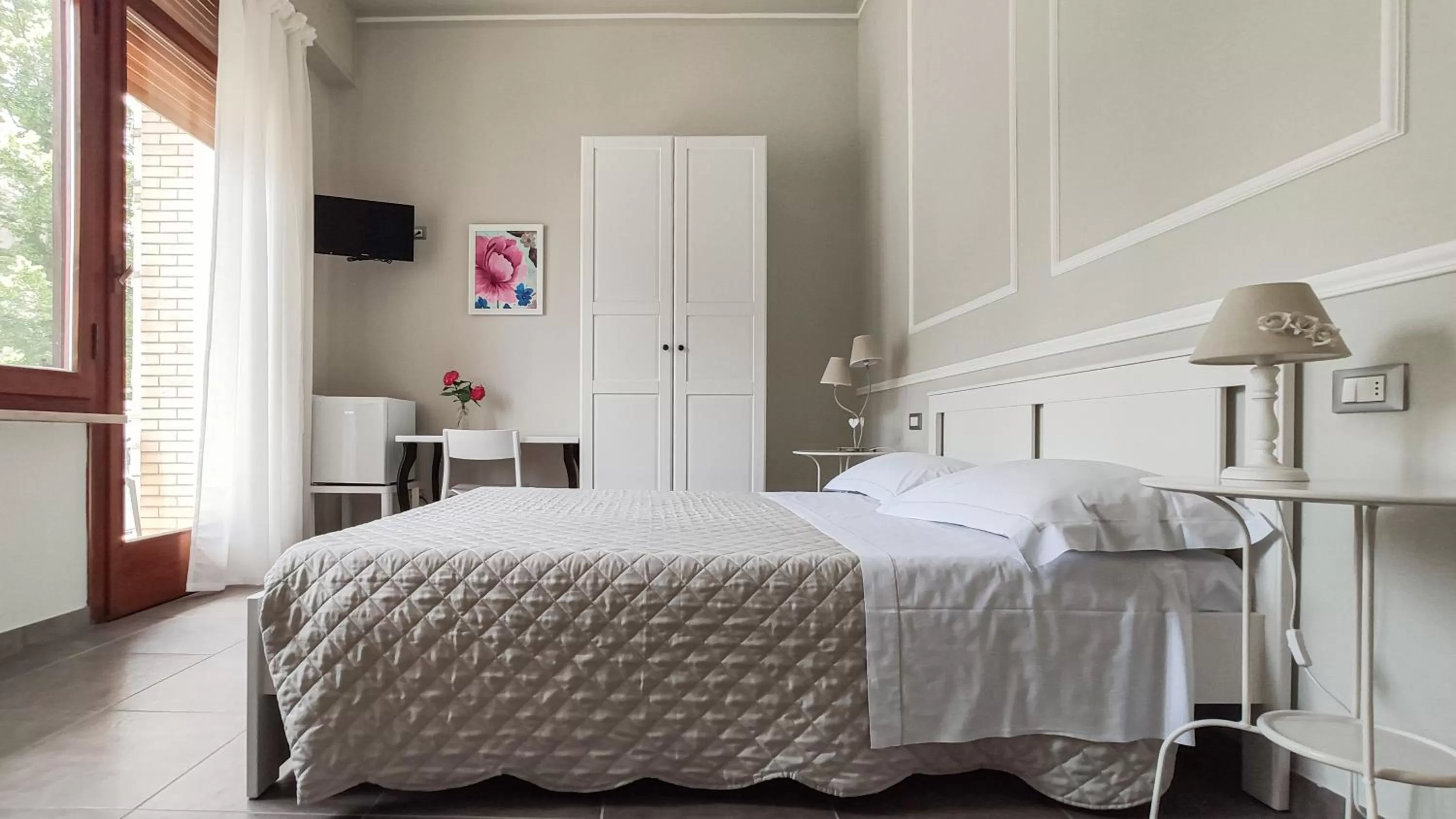 Bed in LA DAMA ROOM&BREAKFAST