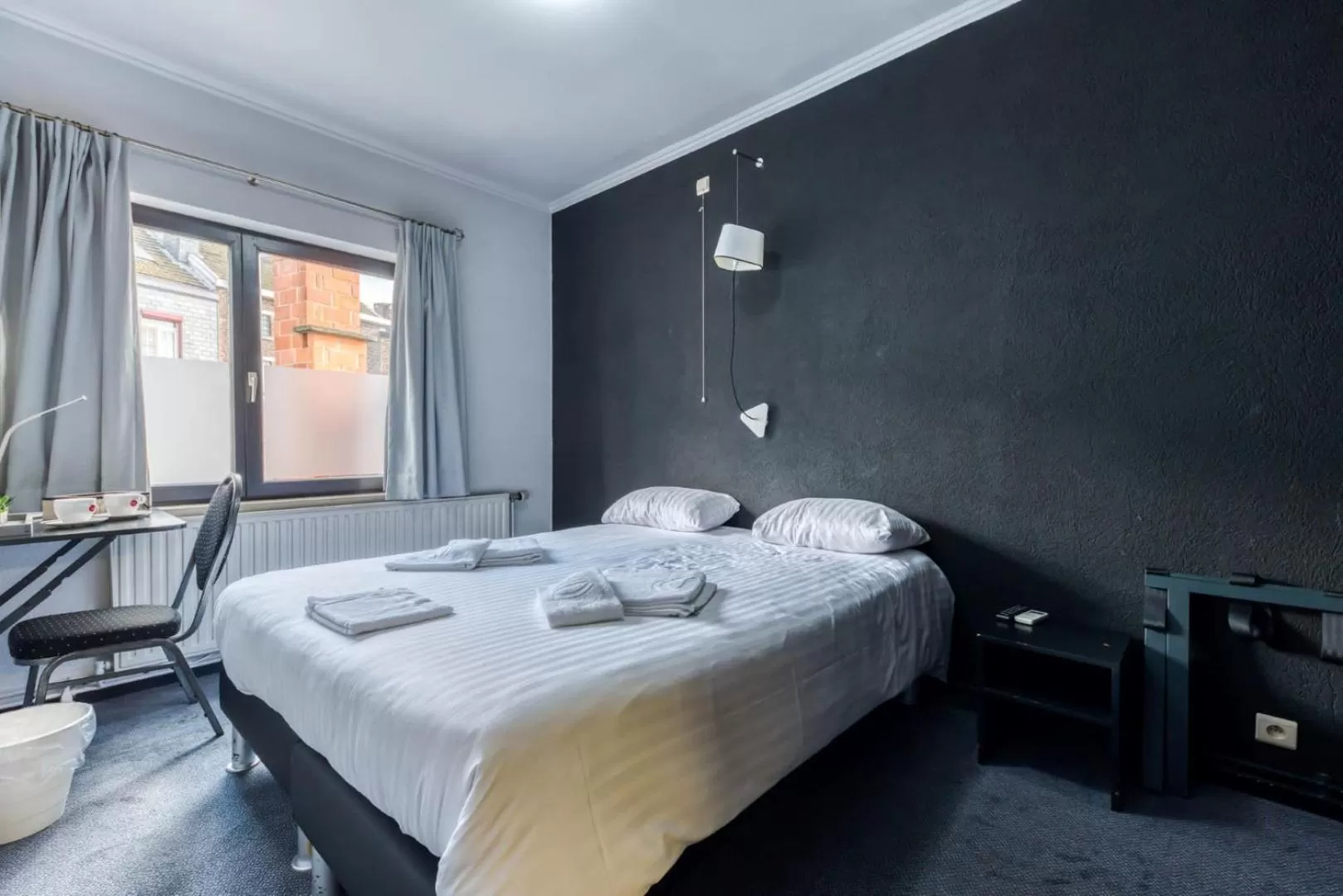 Photo of the whole room, Bed in Hôtel de la Gare
