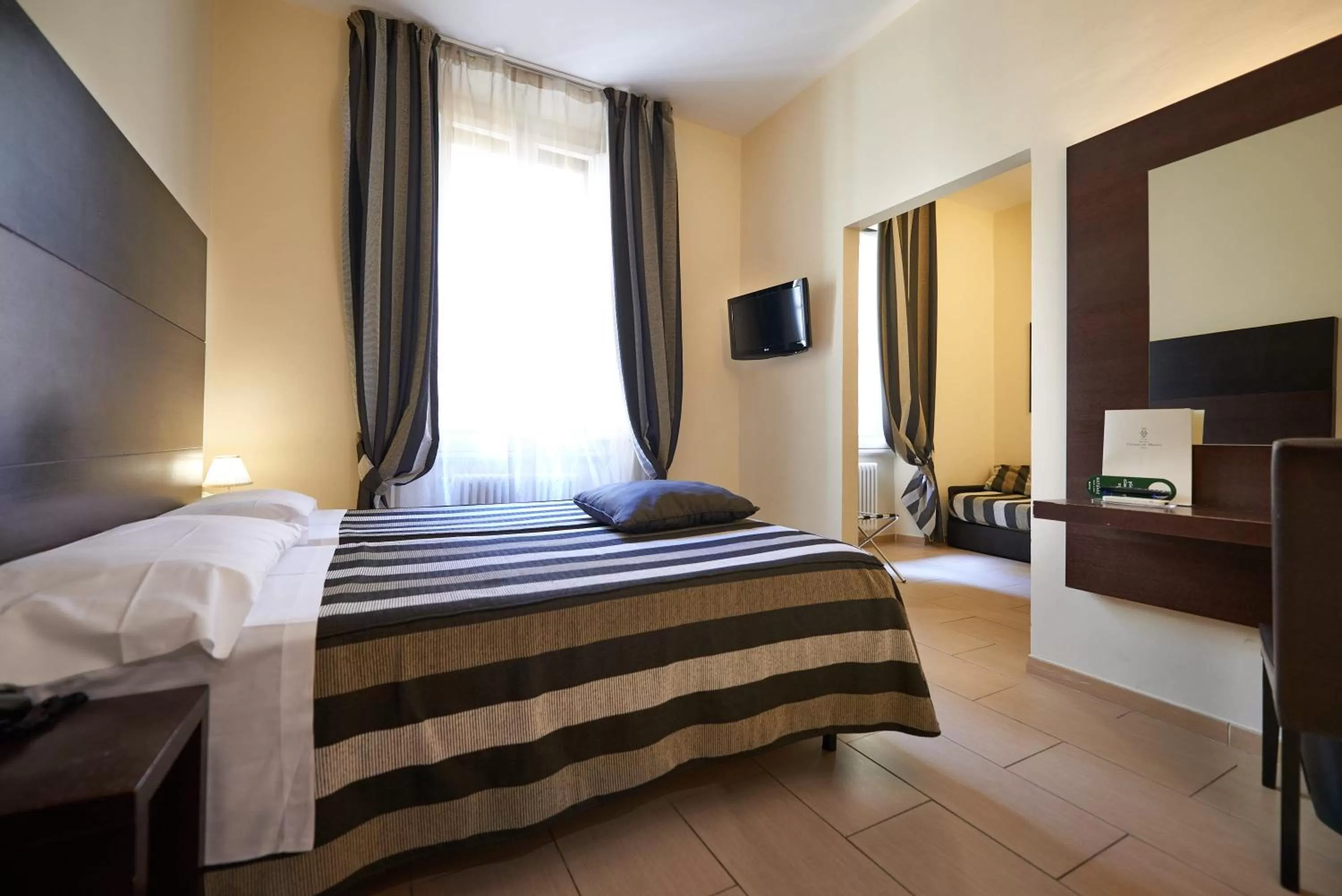 Bed in Hotel Cosimo de' Medici