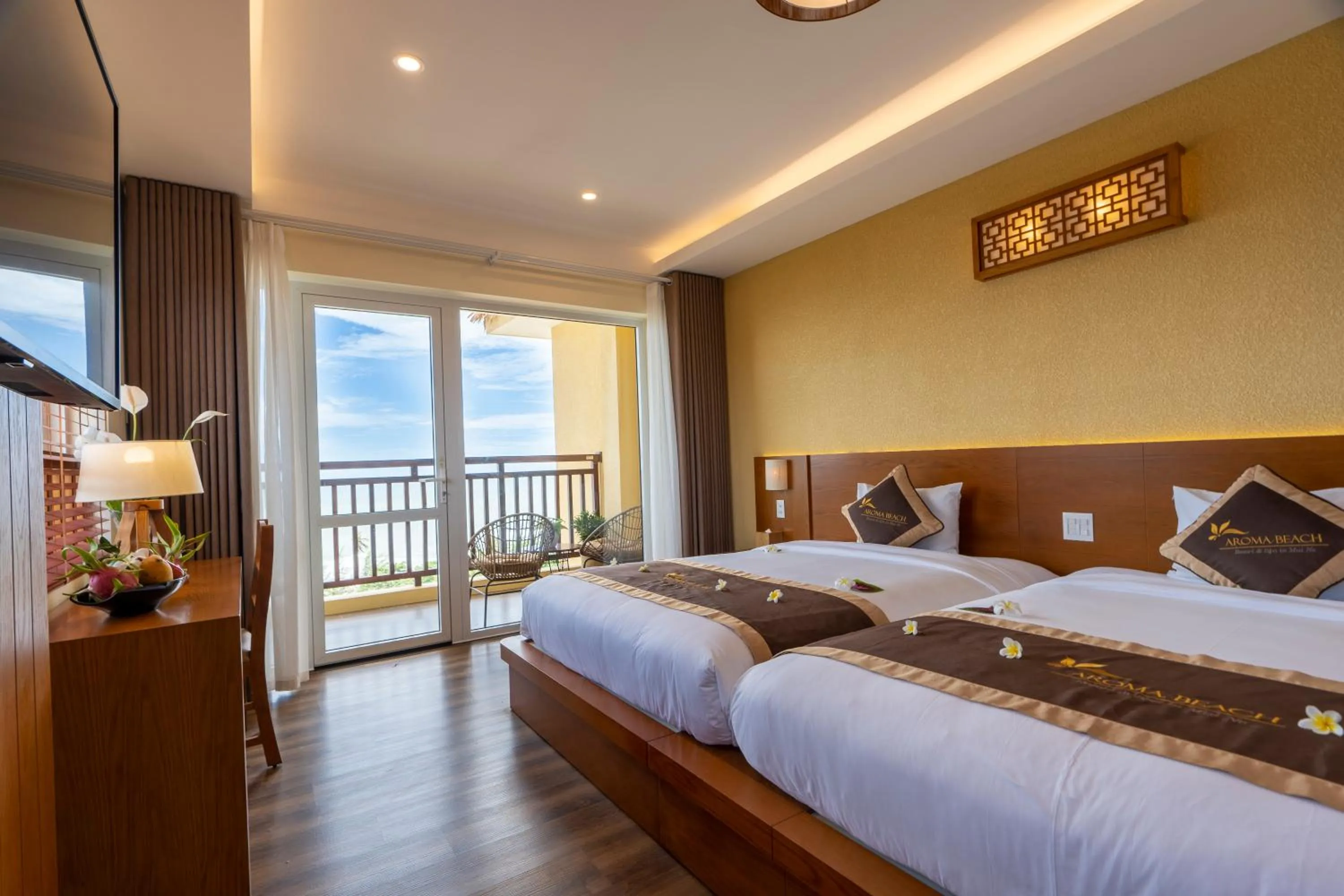 Bed in Aroma Beach Resort and Spa