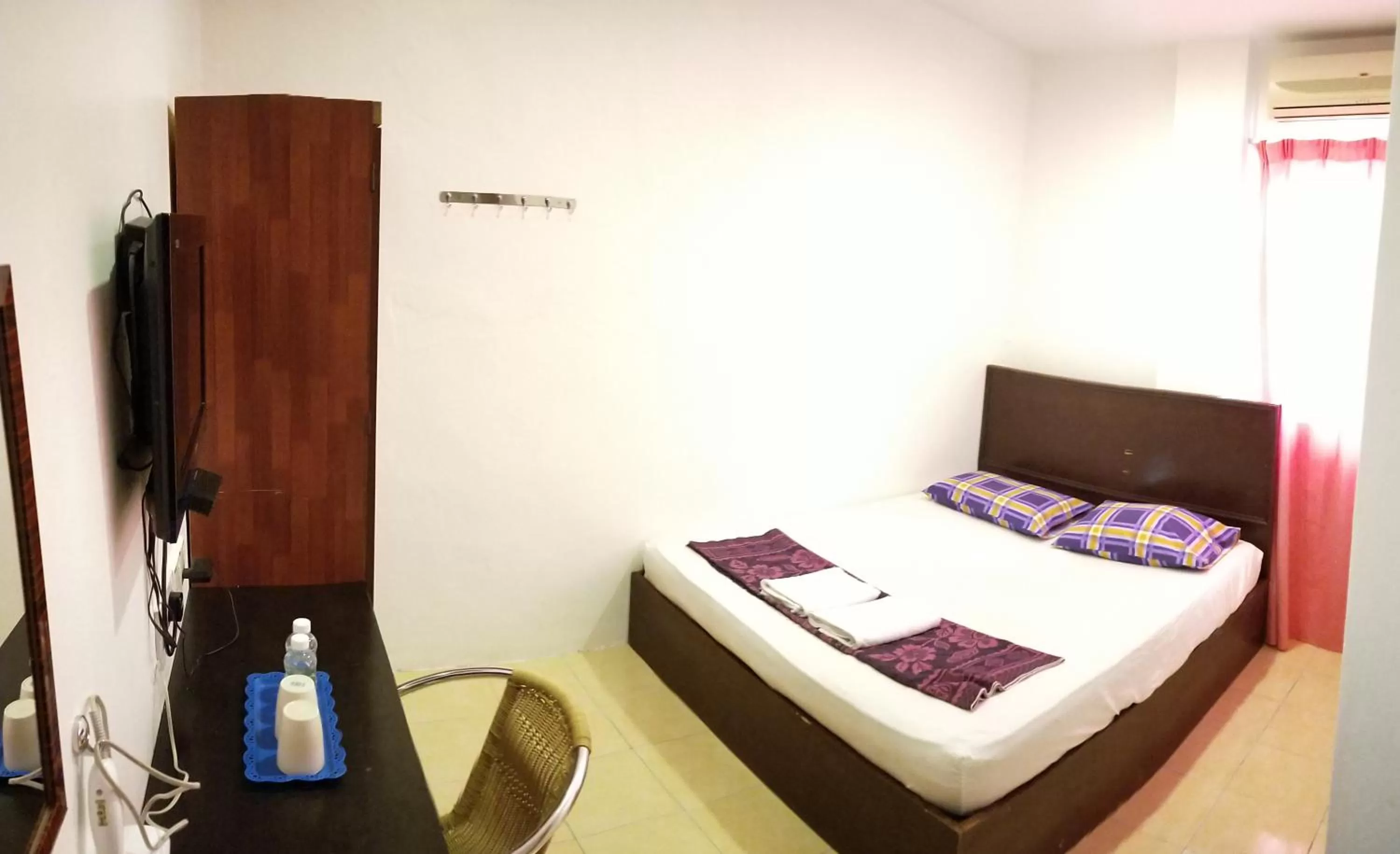 Bed in Hotel Tanjong