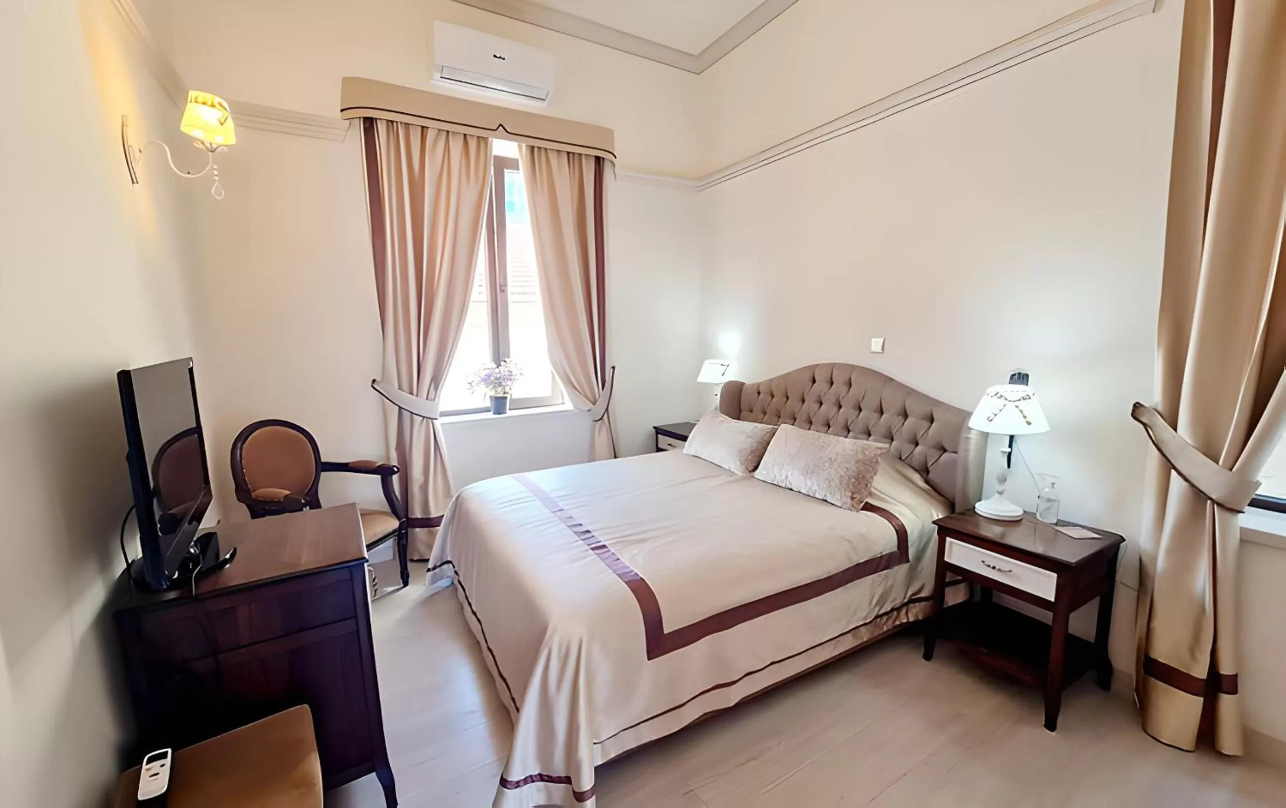 Bed in SOFIA BOUTIQUE HOTEL