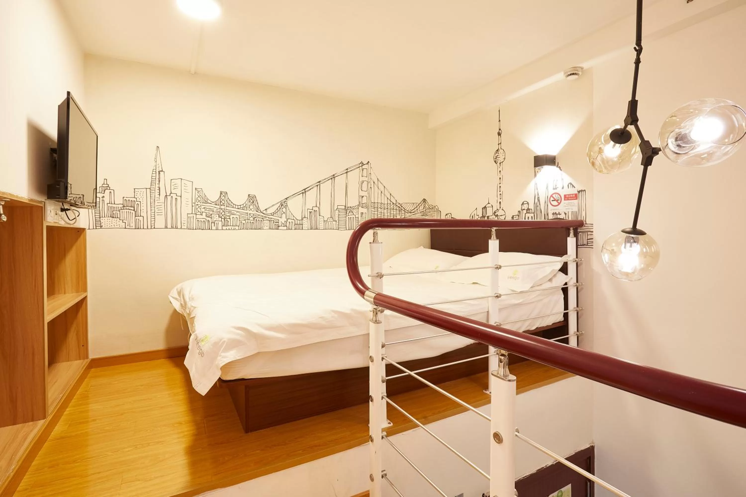 Bed in Meego Yes Hotel