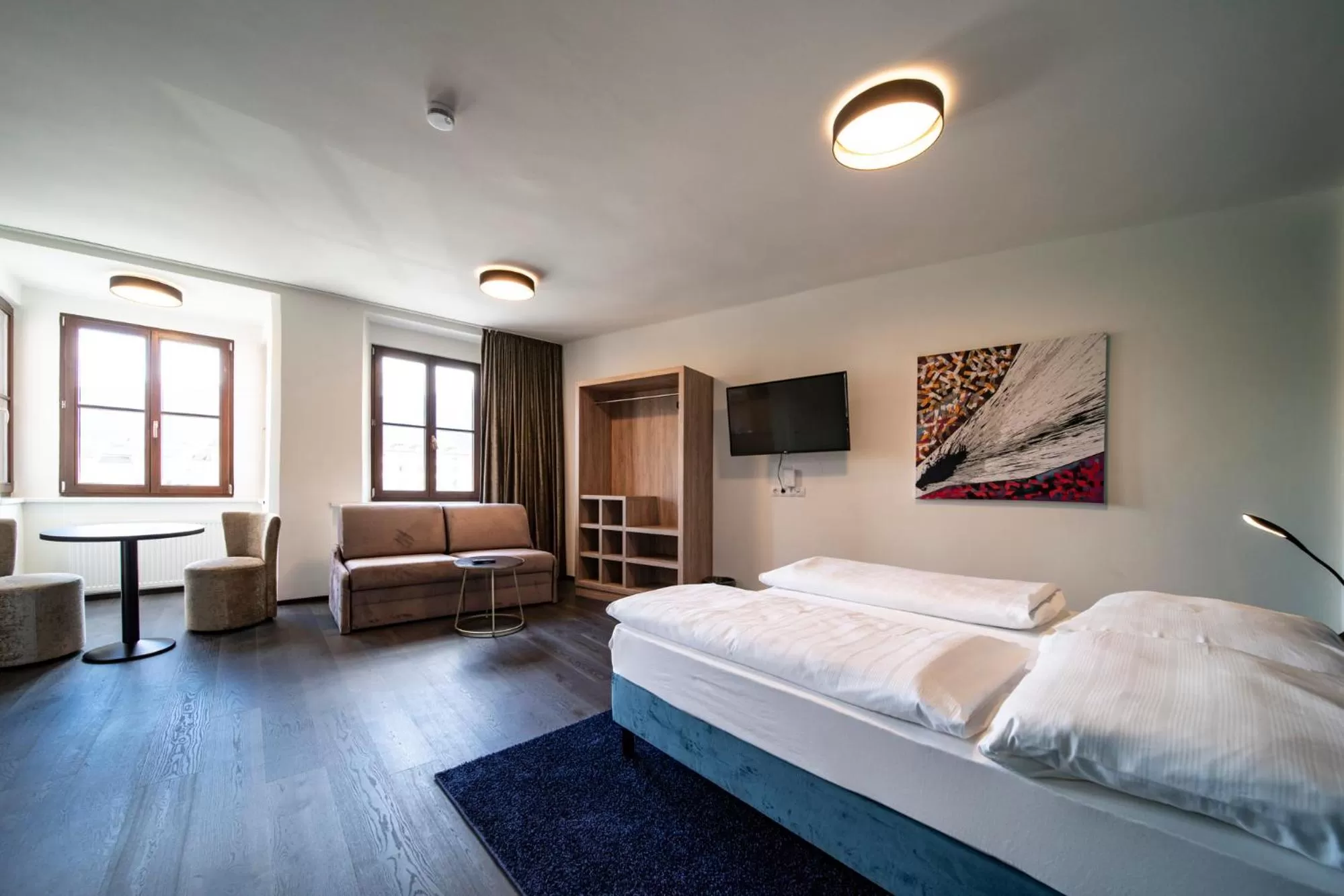 Photo of the whole room, Bed in Blackhome Innsbruck Boutique I contactless check-in