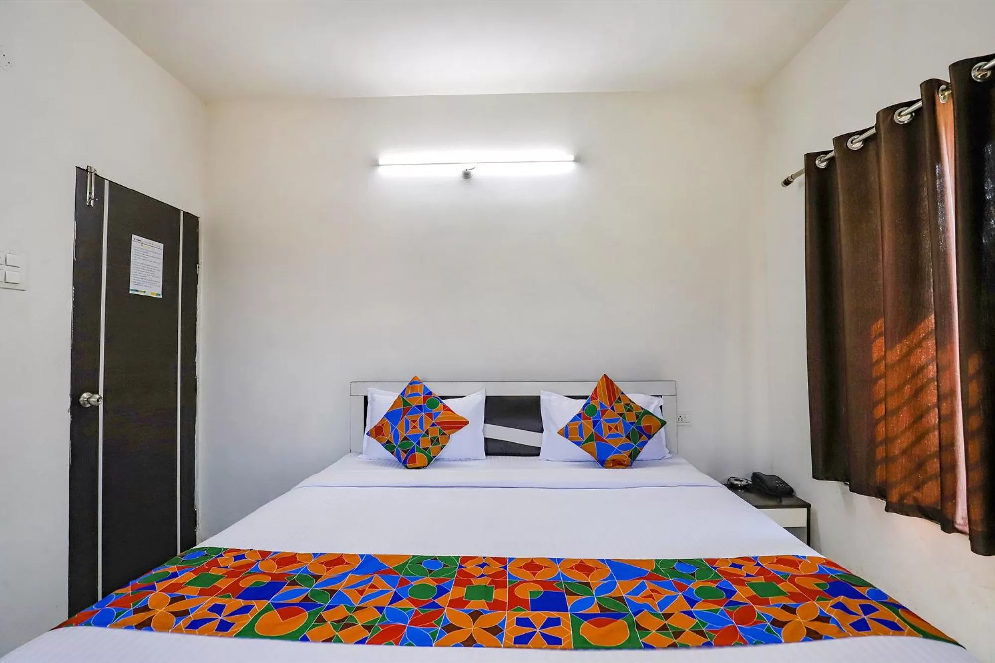 Bed in FabHotel Elite Palm