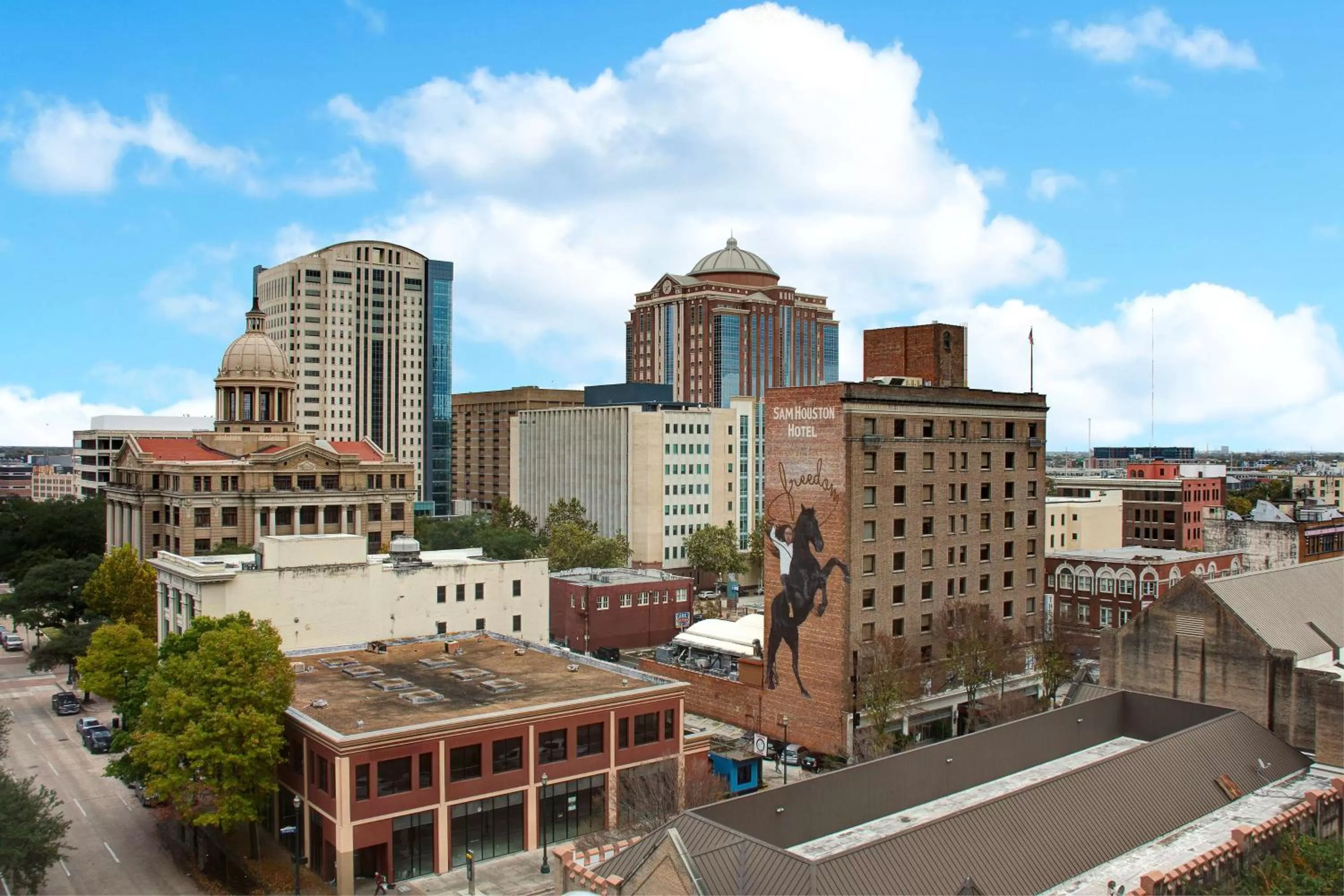 Property building in The Sam Houston Hotel, Curio Collection by Hilton