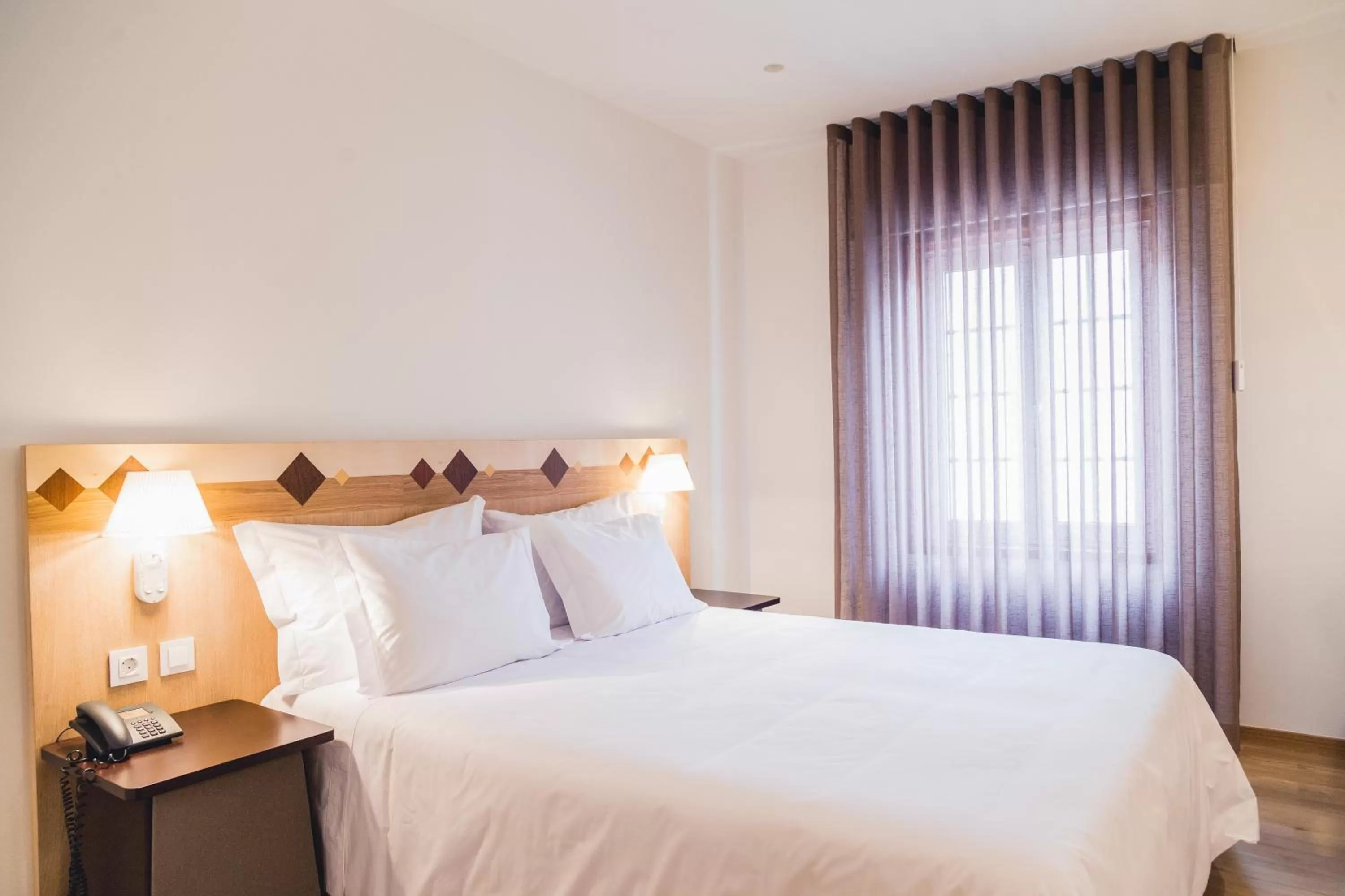 Bedroom, Bed in Hotel Aveiro Center by Alboi Group