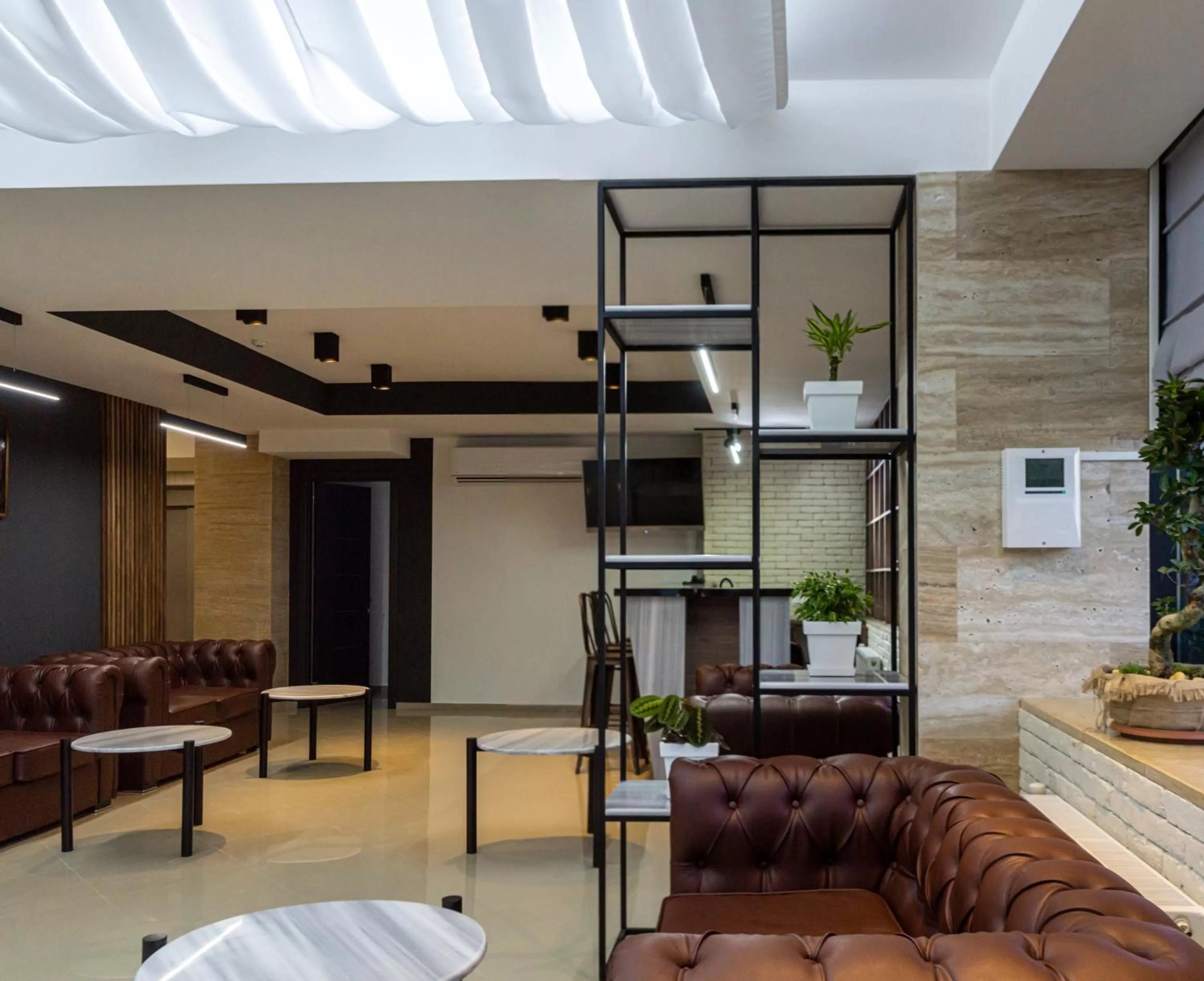 Communal lounge/ TV room in BG Palace Hotel