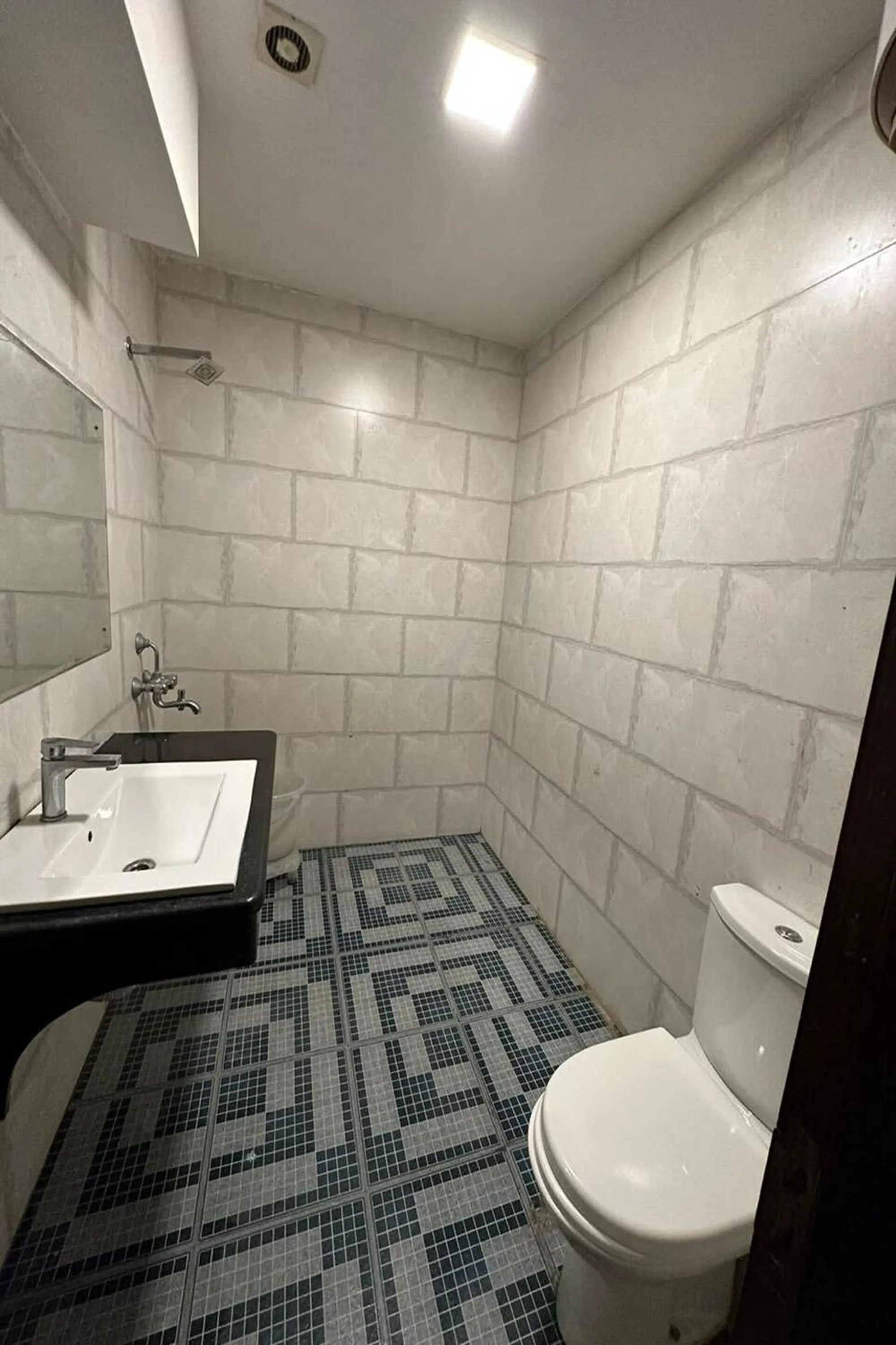 Bathroom in Hotel Amenda International