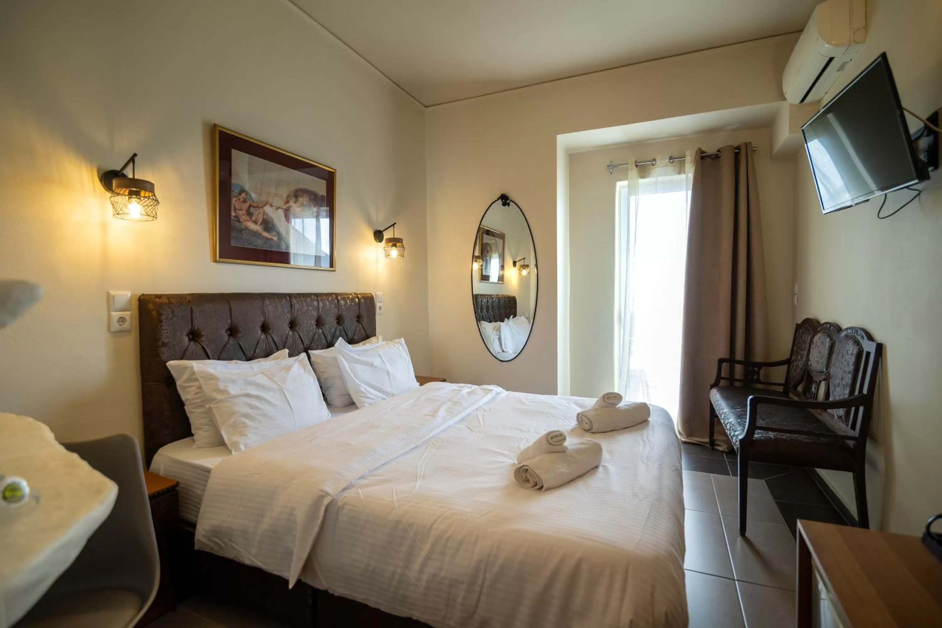 Bed in Votsalakia Hotel & Luxury Apartments