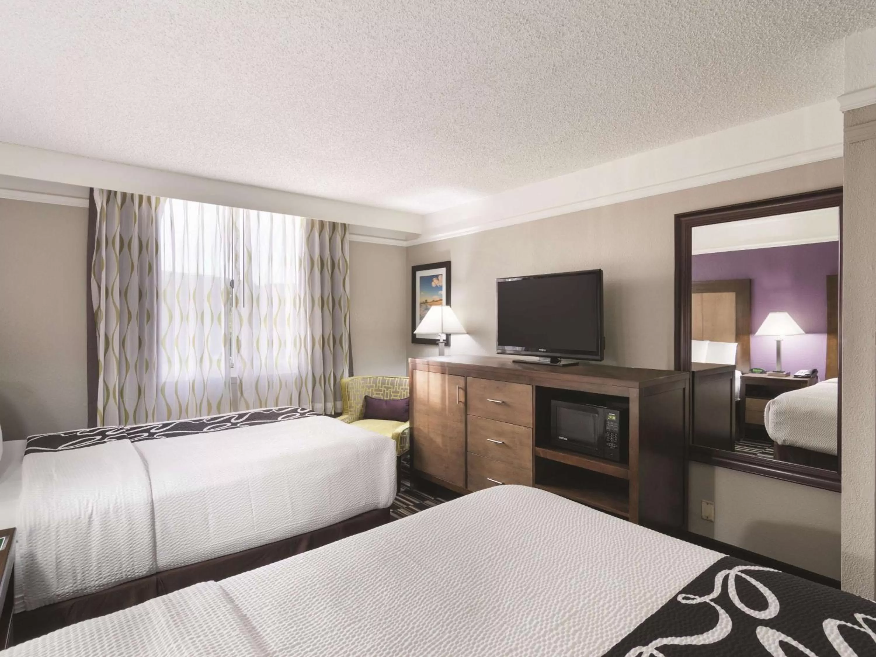 Photo of the whole room, Bed in La Quinta Inn by Wyndham Jupiter