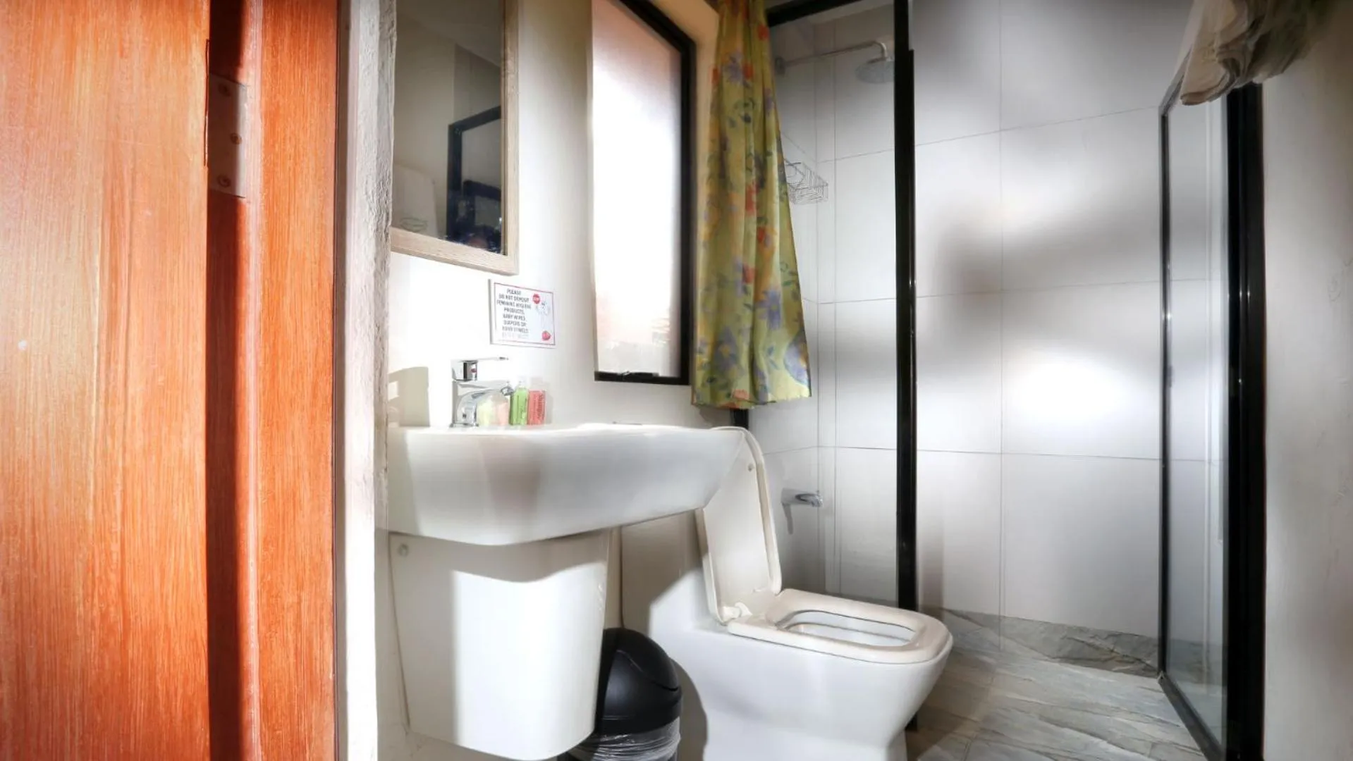 Toilet in 1775 Adriatico Suites