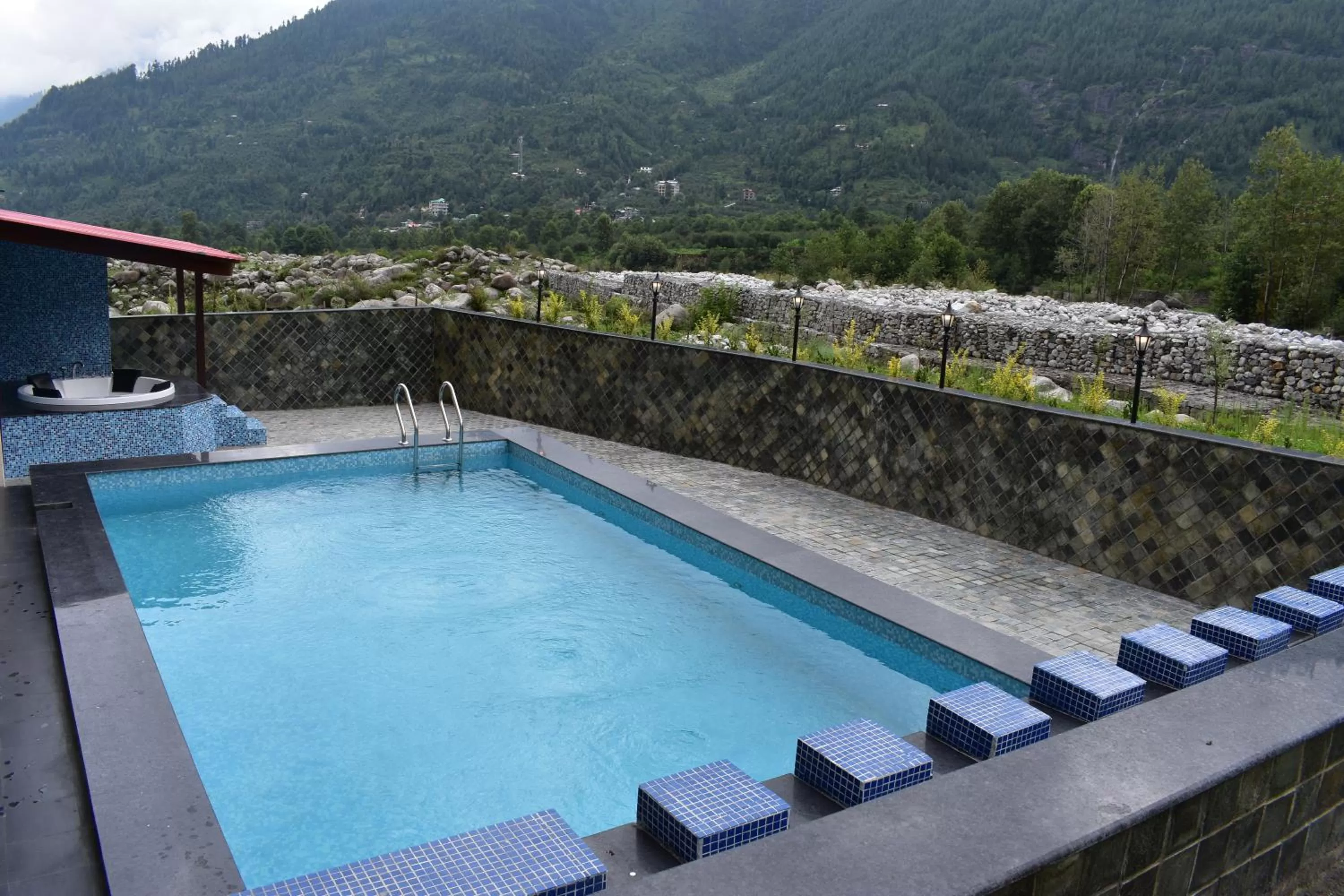 Swimming pool in The Allure Grand Resort -A Majestic Riverside Retreat