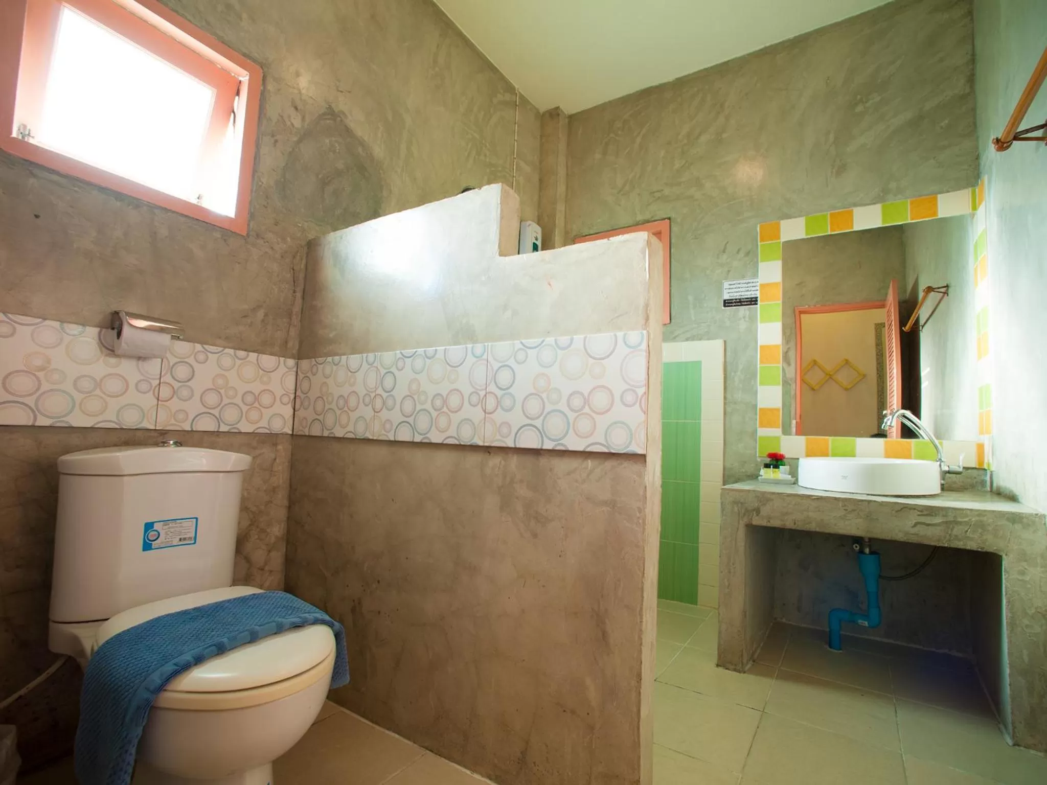 Toilet in Baan Chokdee Pai Resort