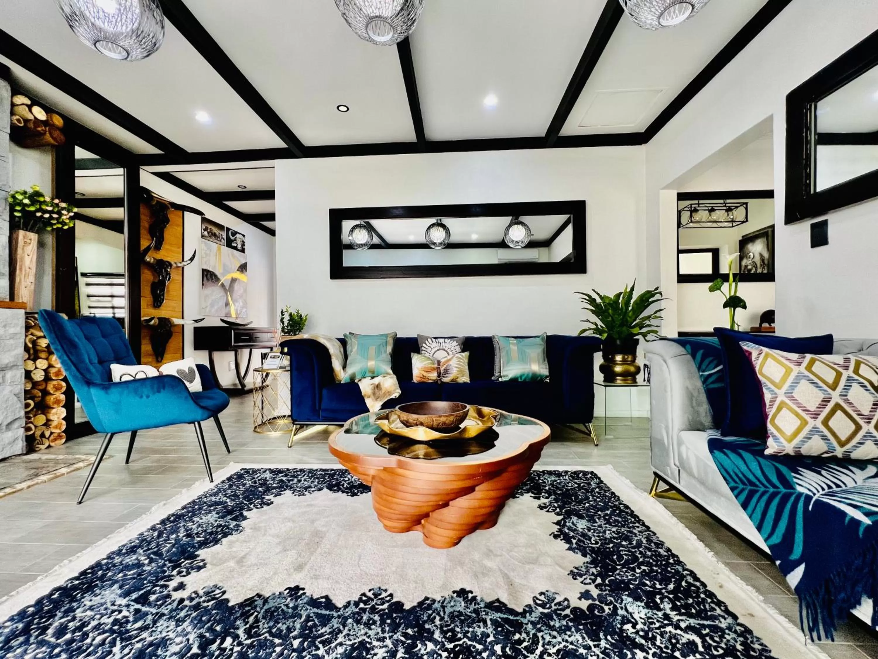 Seating area in 24 On Basil Inventive suites