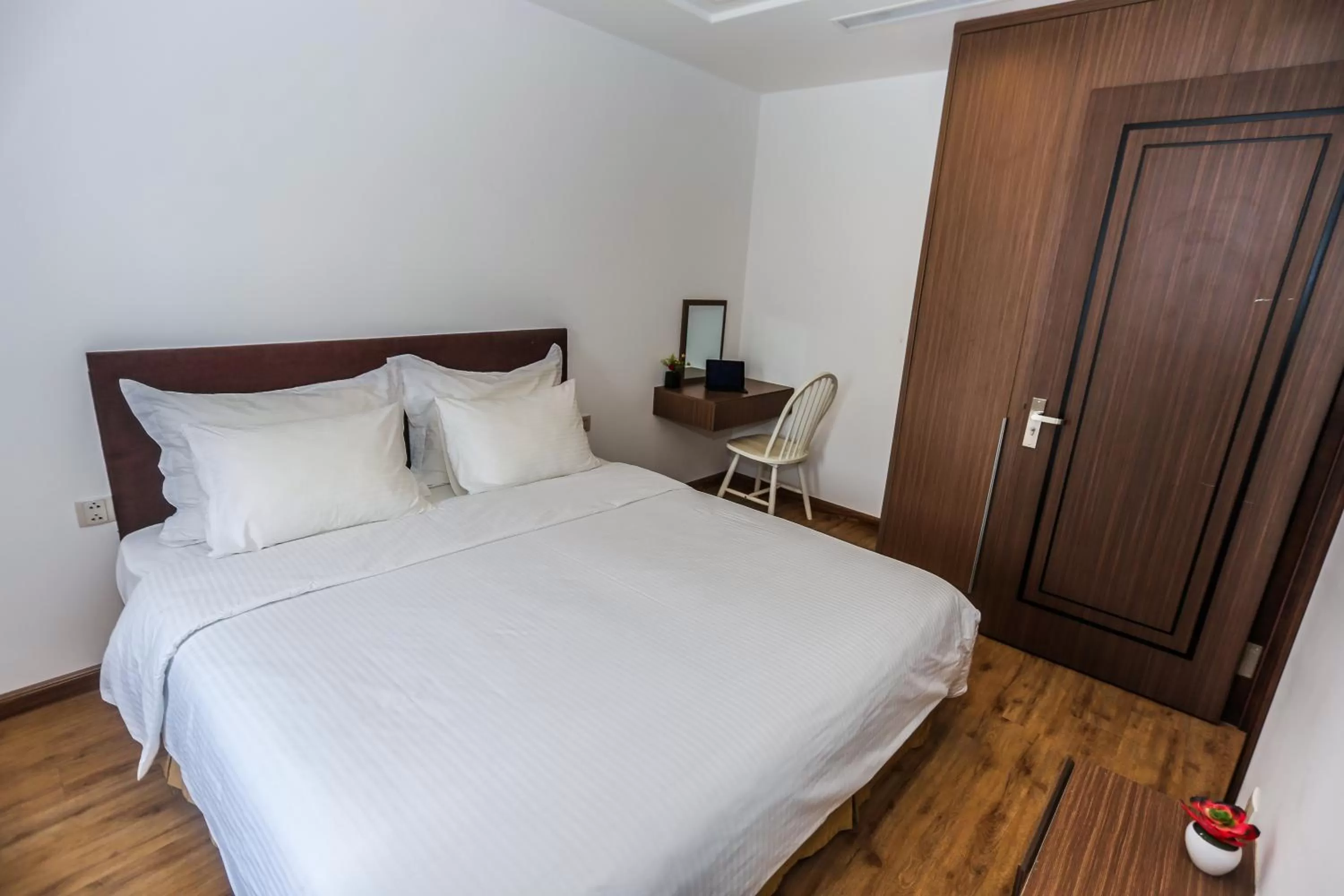 Bed in HNC Premier Hotel & Residences