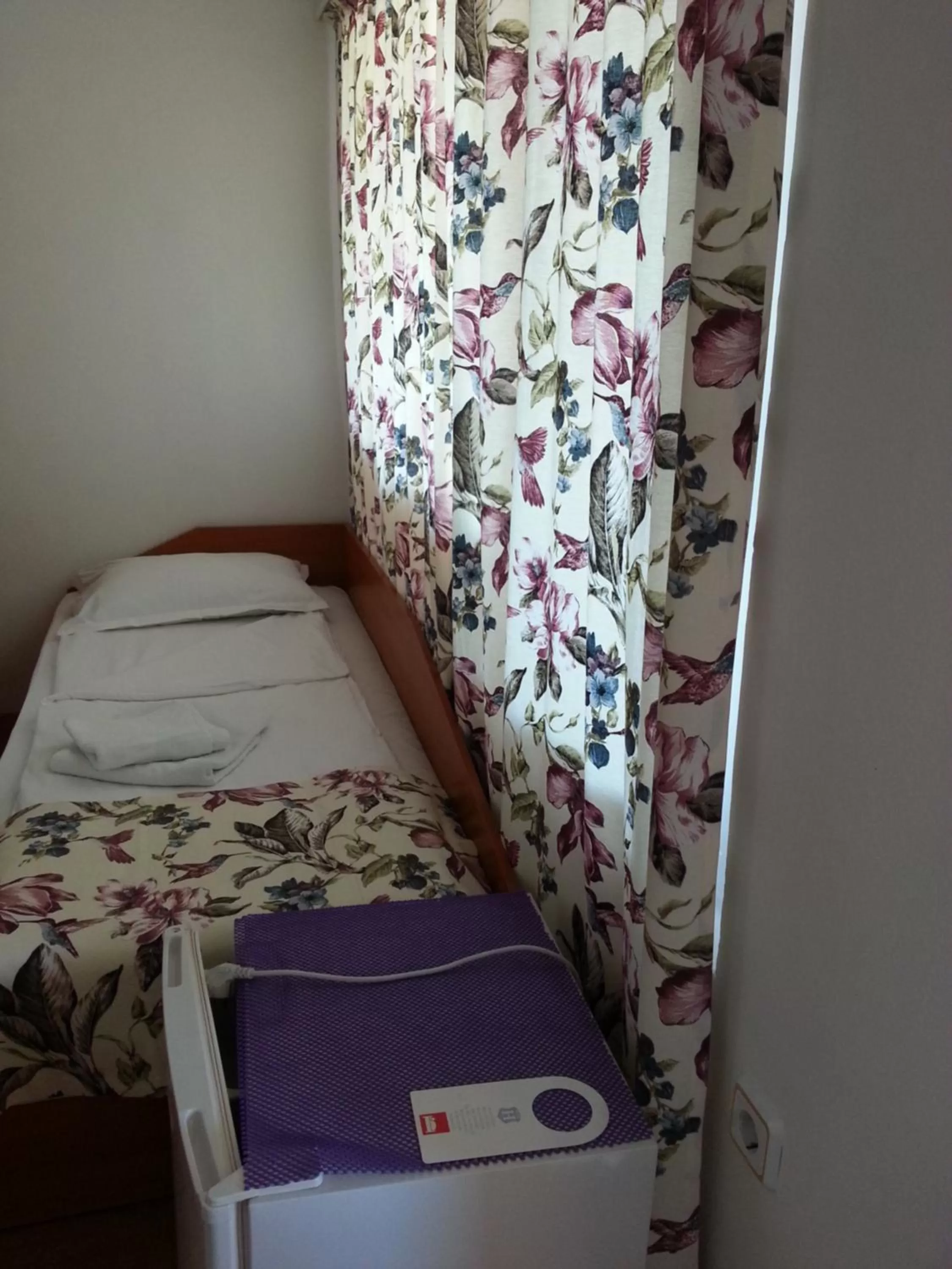 Bed in Hotel Poseidon