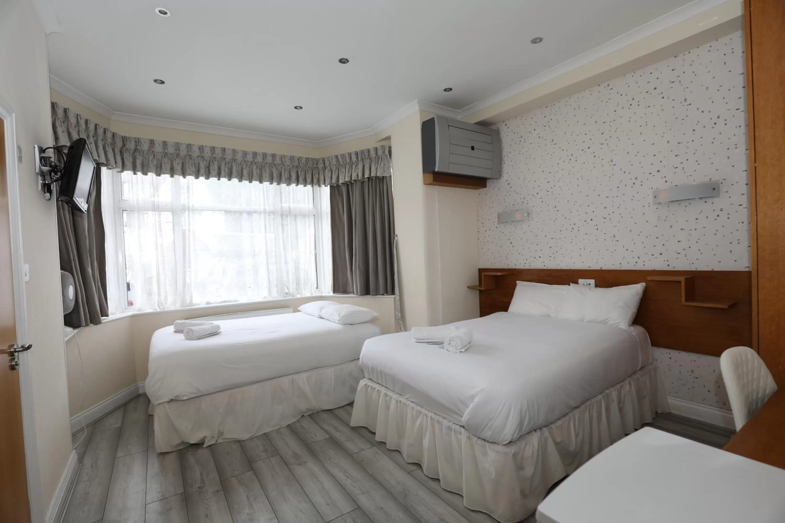 Bed in Anchor Guest House