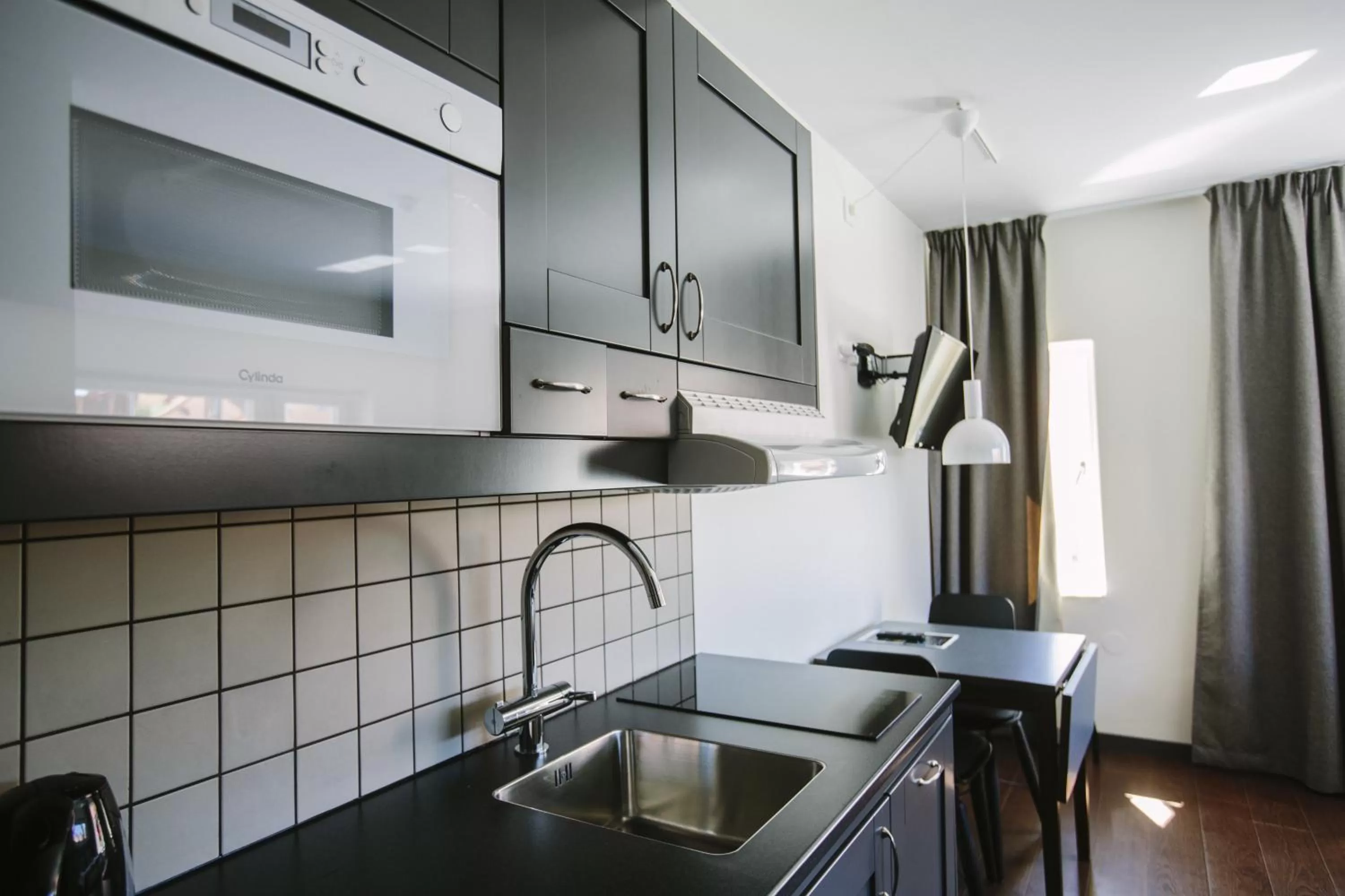 Kitchen or kitchenette in Best Western Plus Hotell Nordic Lund