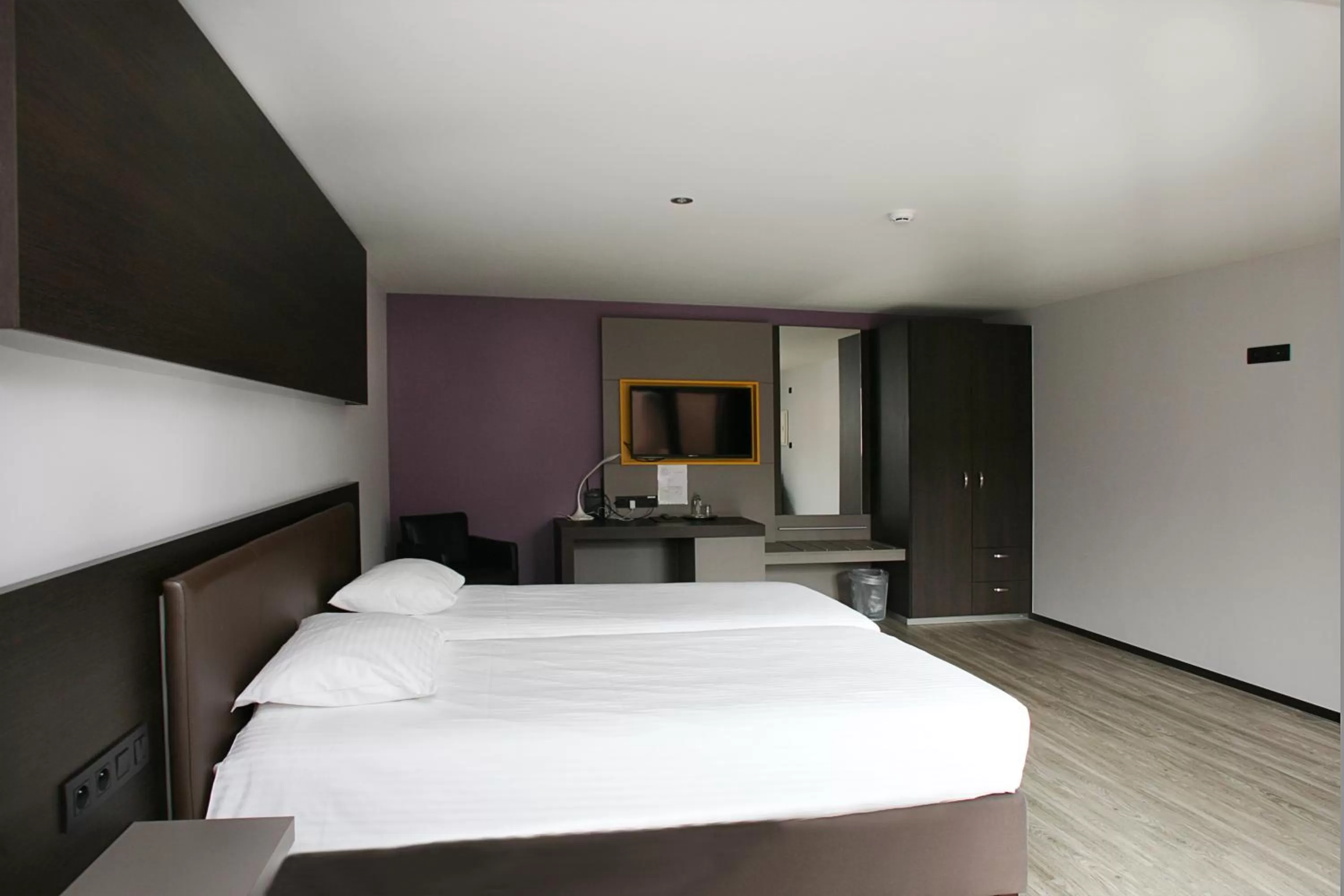 Bed in Hotel Au Prince Royal