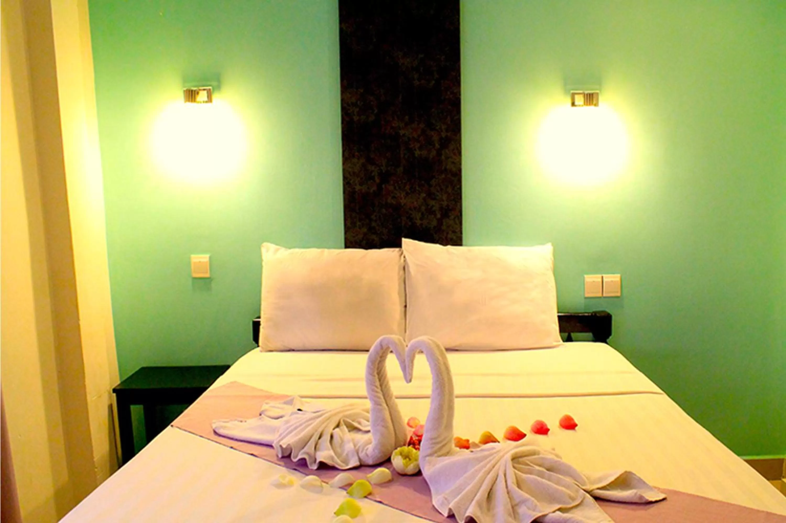 Bed in Angkor International Hotel