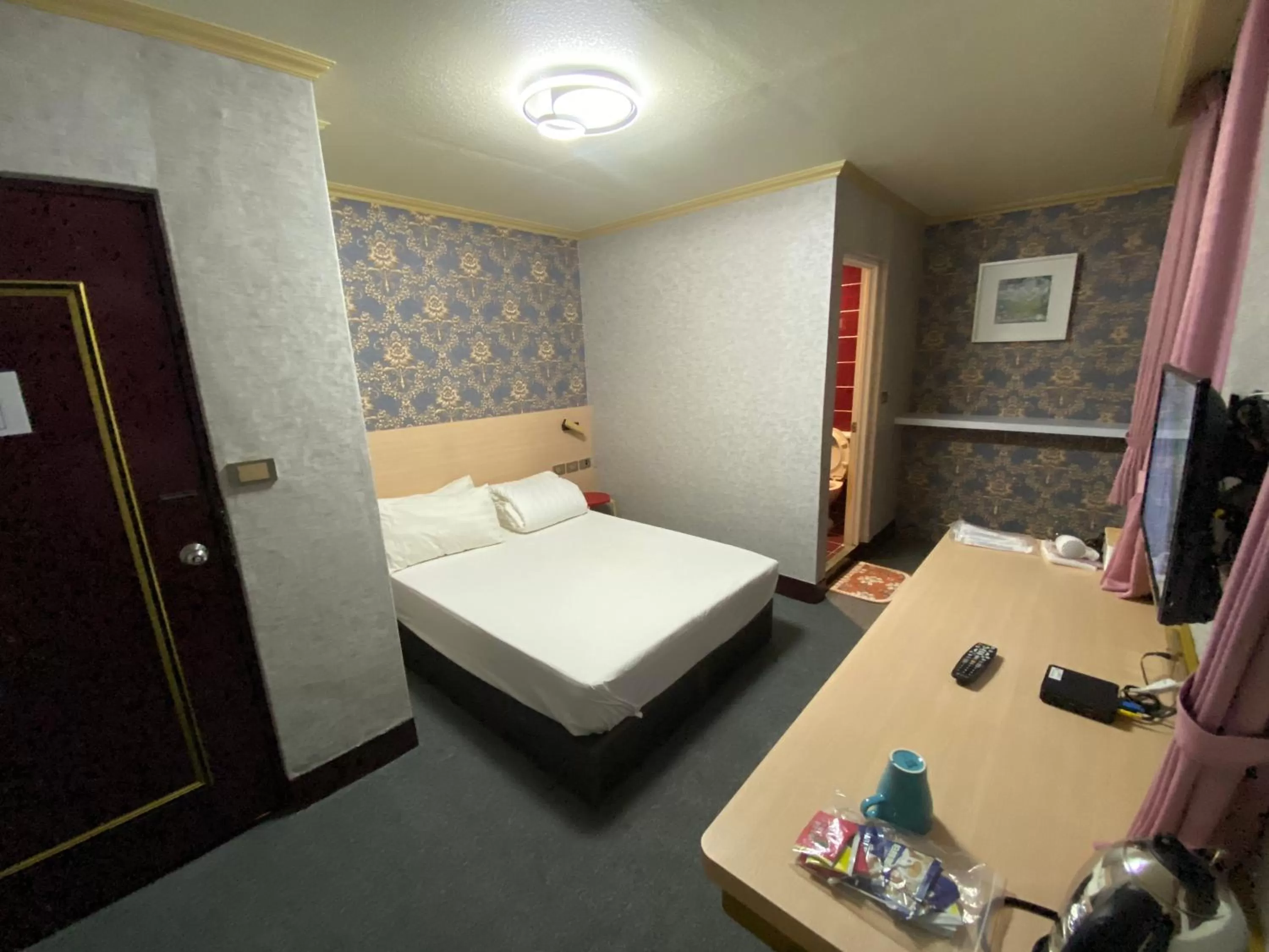 Bedroom, Bed in Rich Zone Hotel