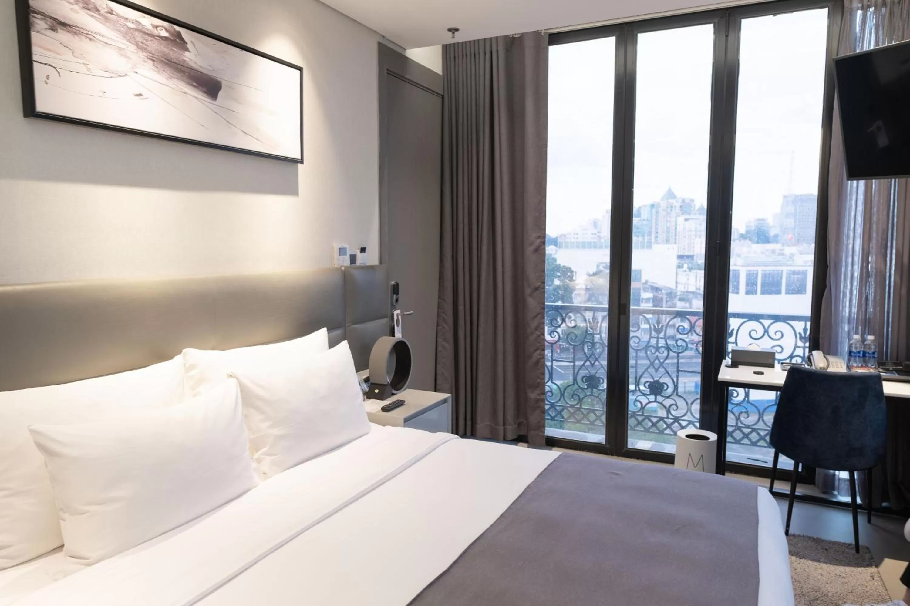 Bed in M Hotel Saigon