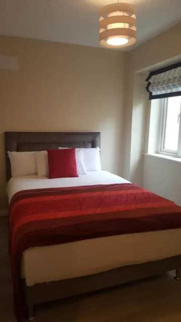 Bed in St Bridget's Apartments