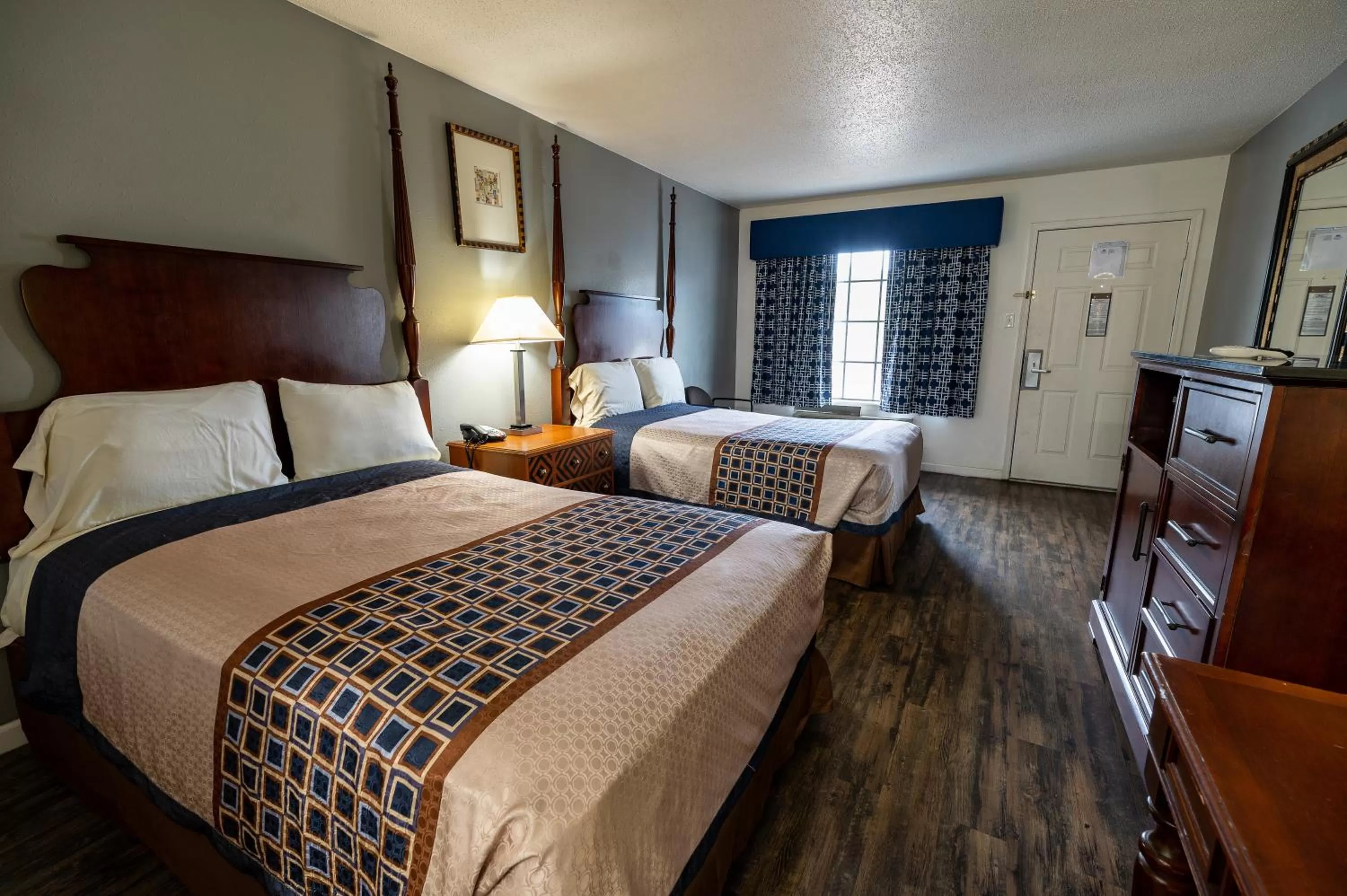 Bedroom, Bed in American Inn & Suites Russellville