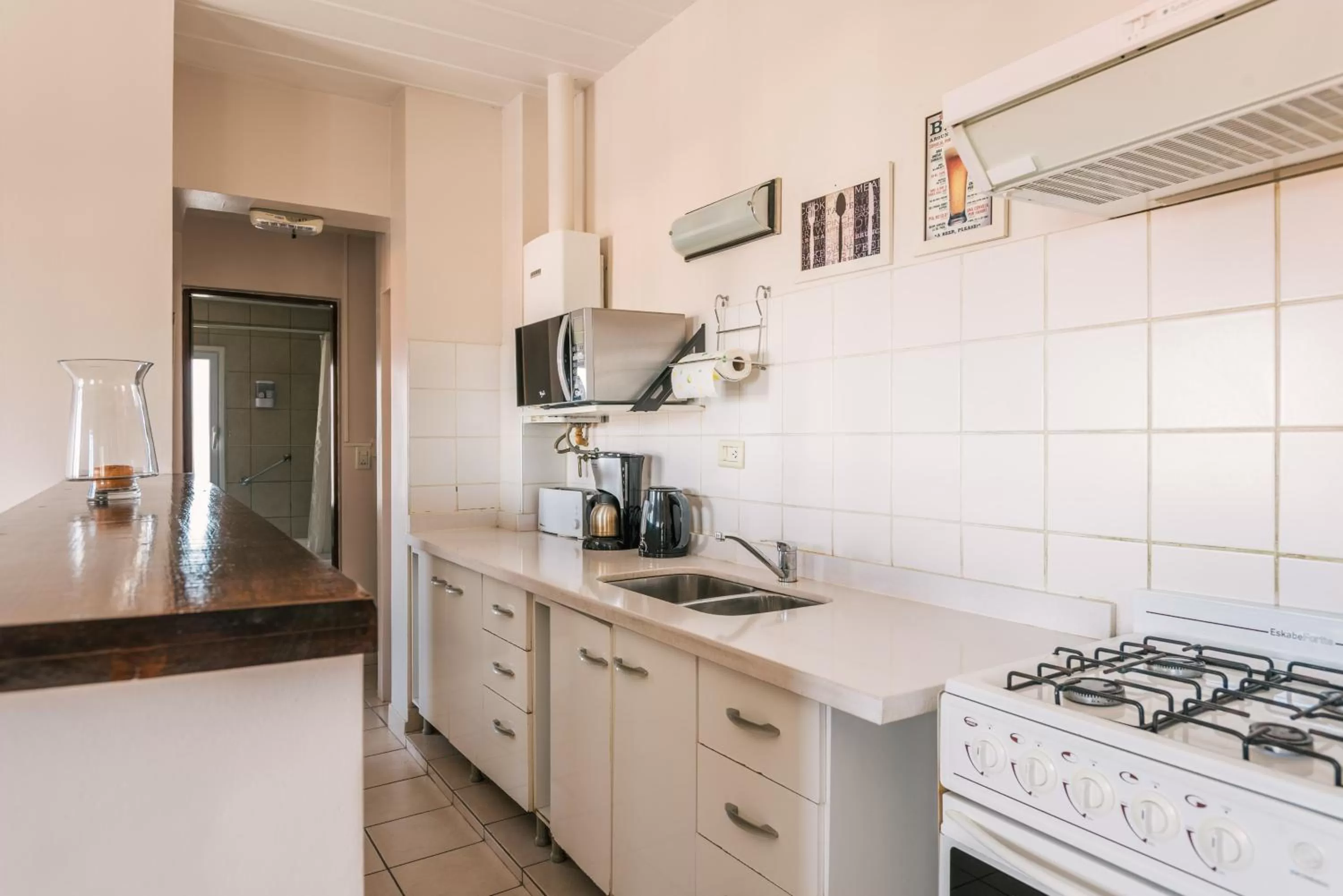 Coffee/tea facilities, Kitchen/Kitchenette in Riviera Fueguina Apartments