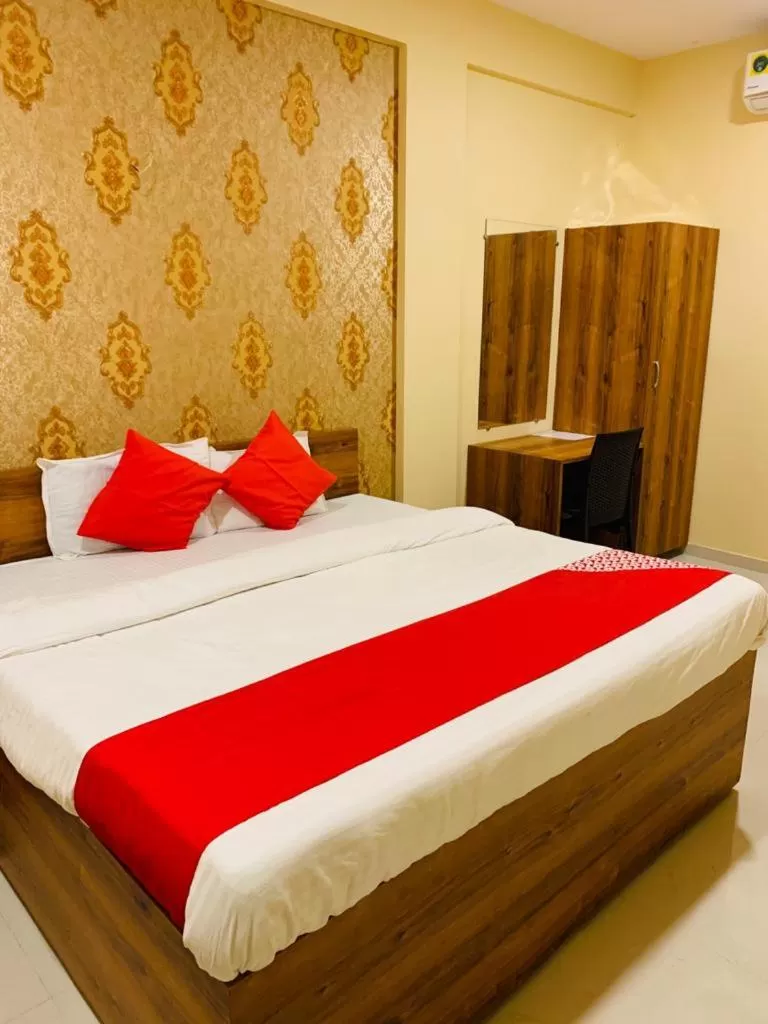 Bed in Hotel Neelkanth