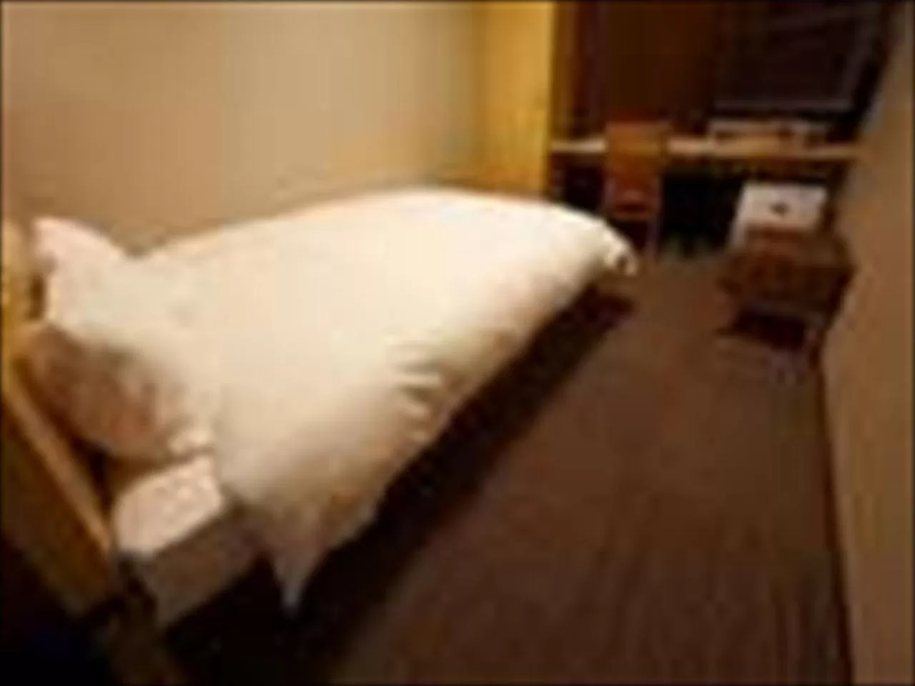 Bed in Dormy Inn Hiroshima