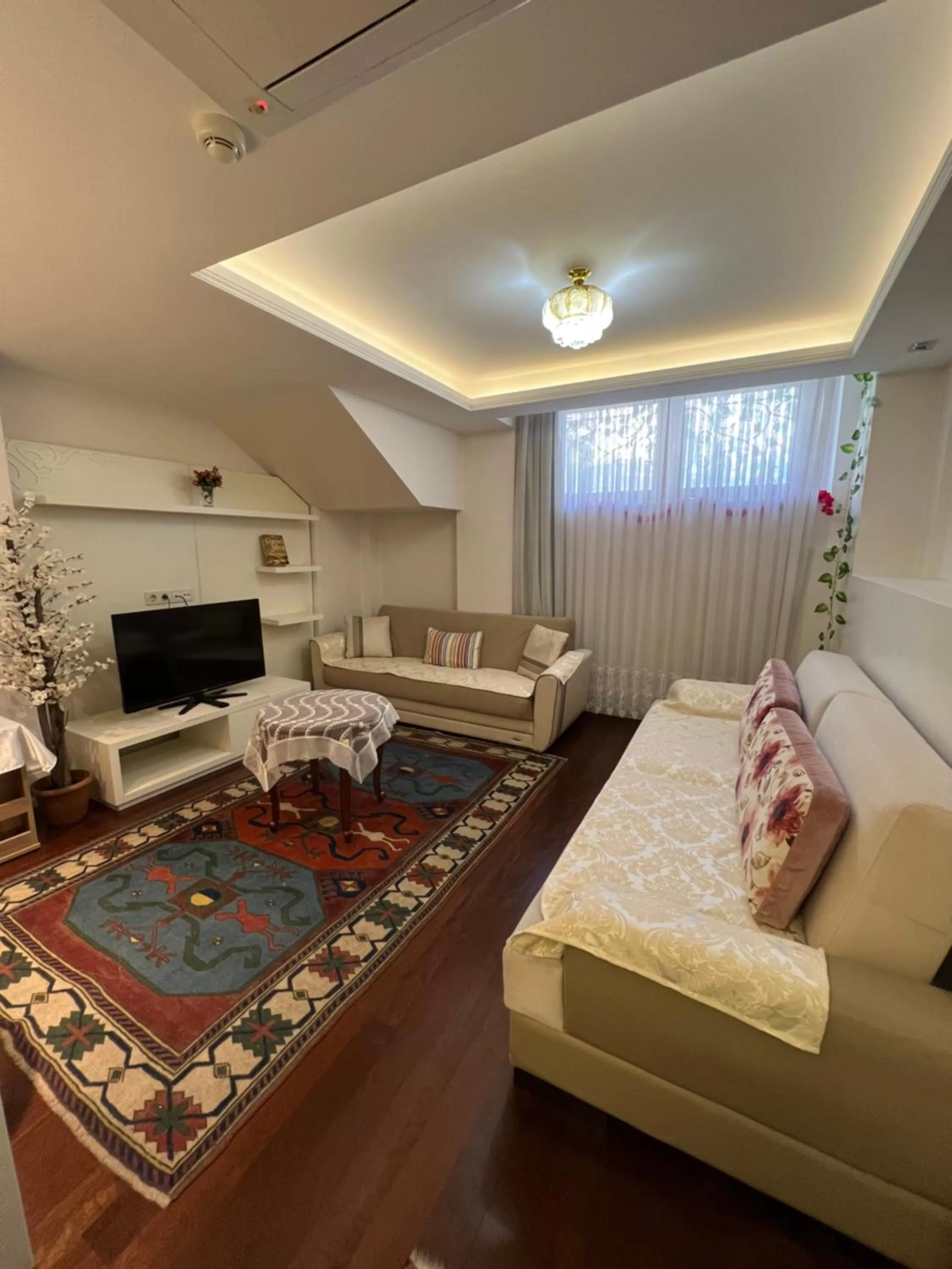 Living room, Bed in Ada Hotel Istanbul