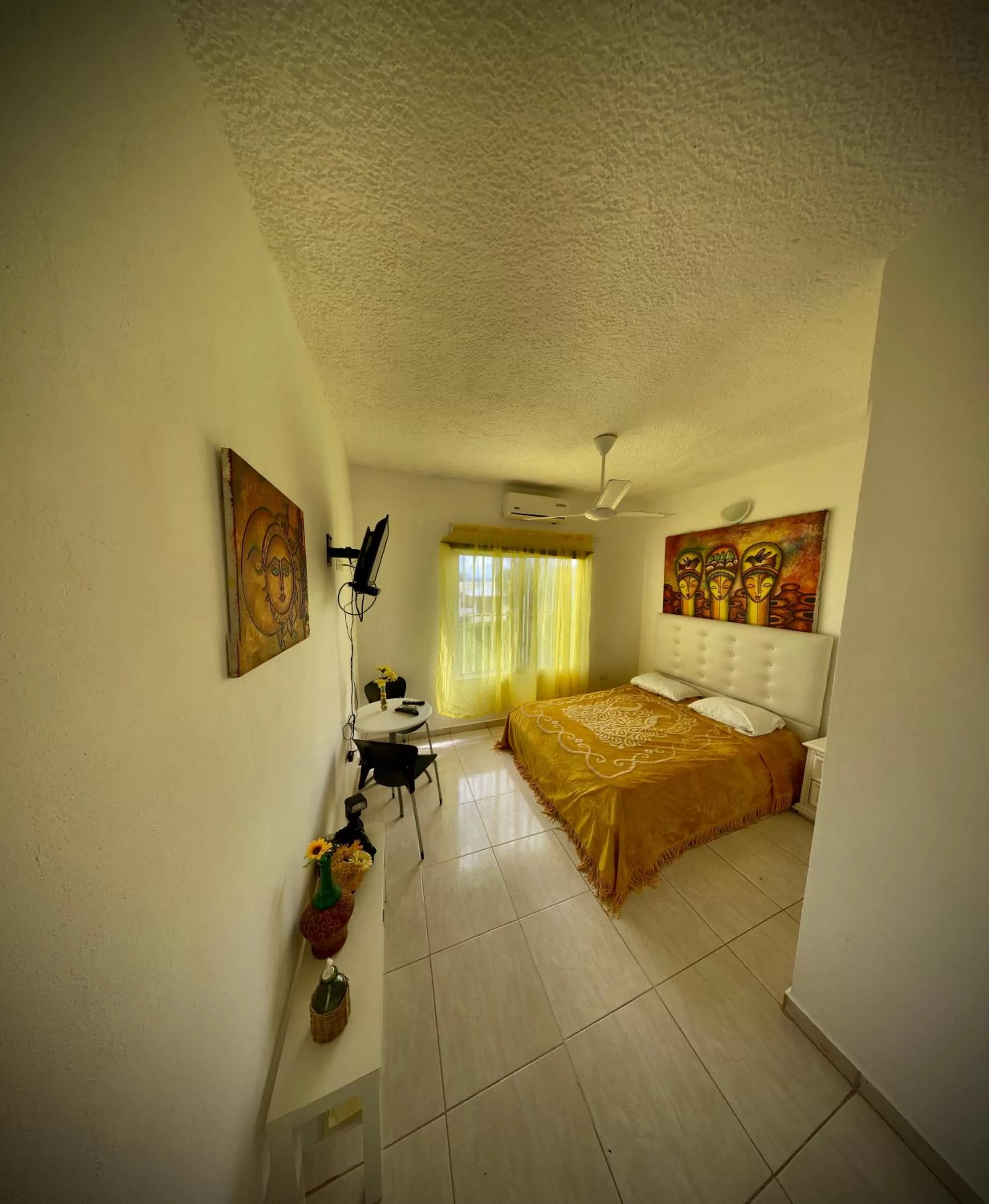 Bed in El Malecon B&B Hotel