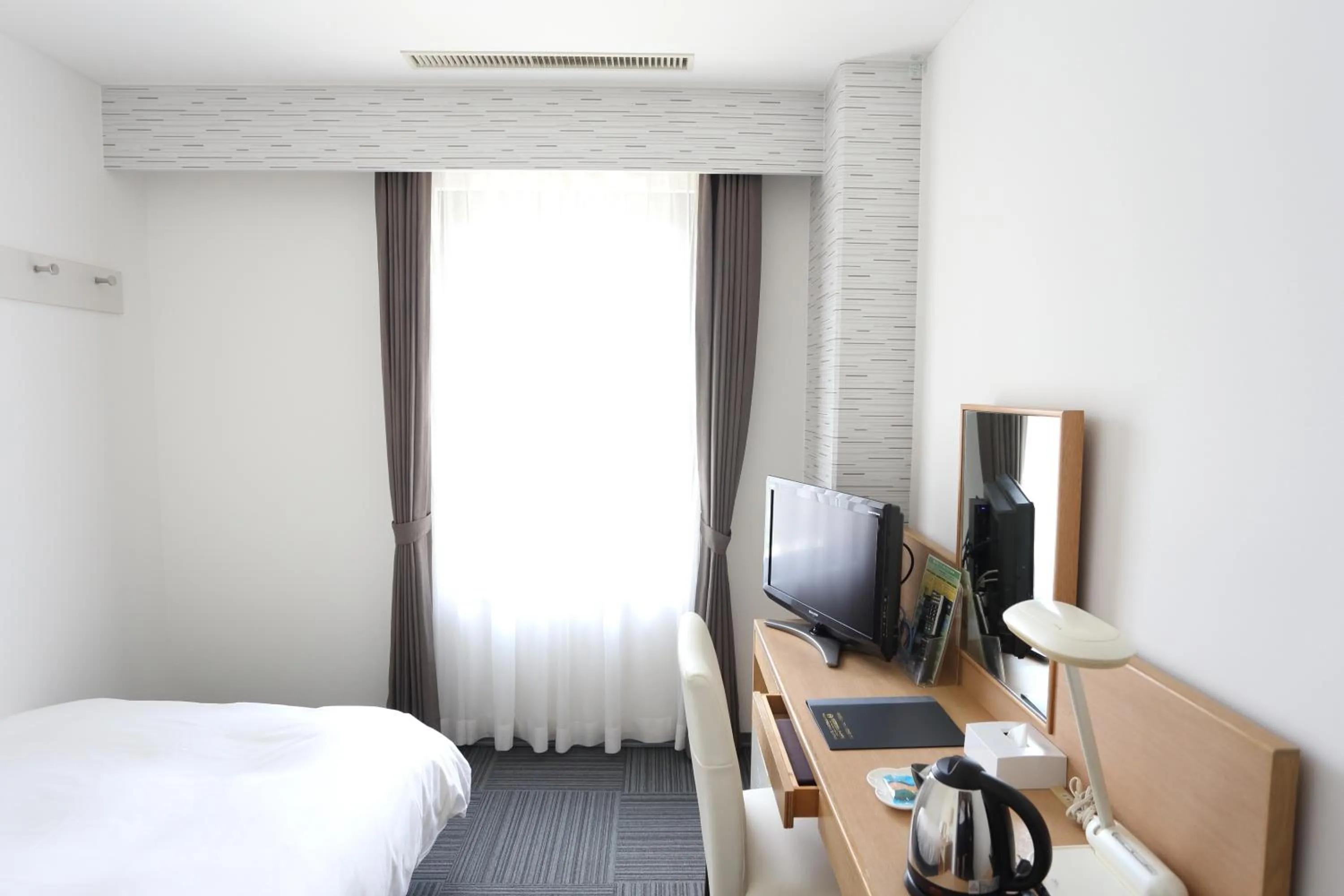 Photo of the whole room, Bed in Hotel International House Osaka