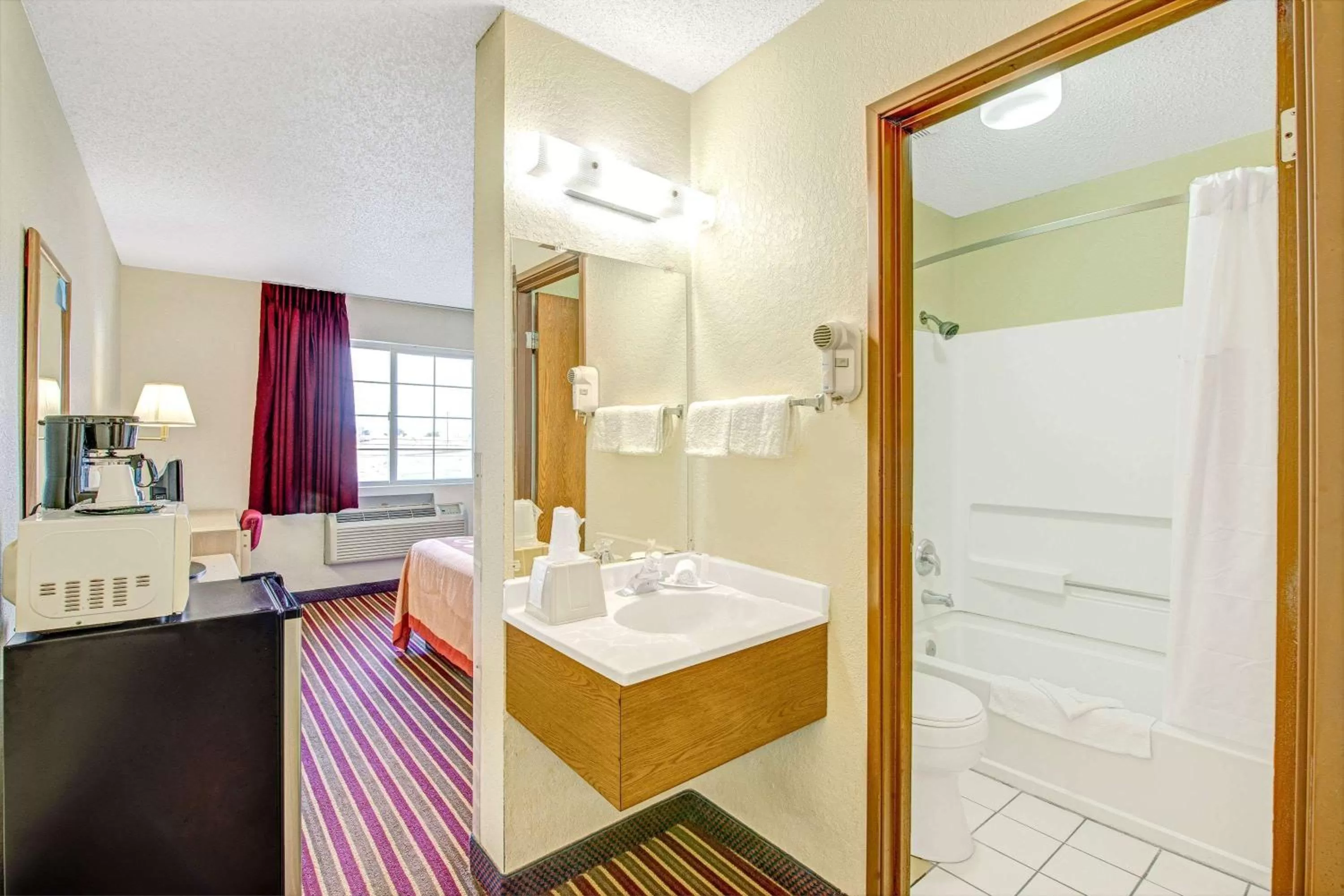 Bathroom in Super 8 by Wyndham San Antonio/Fiesta