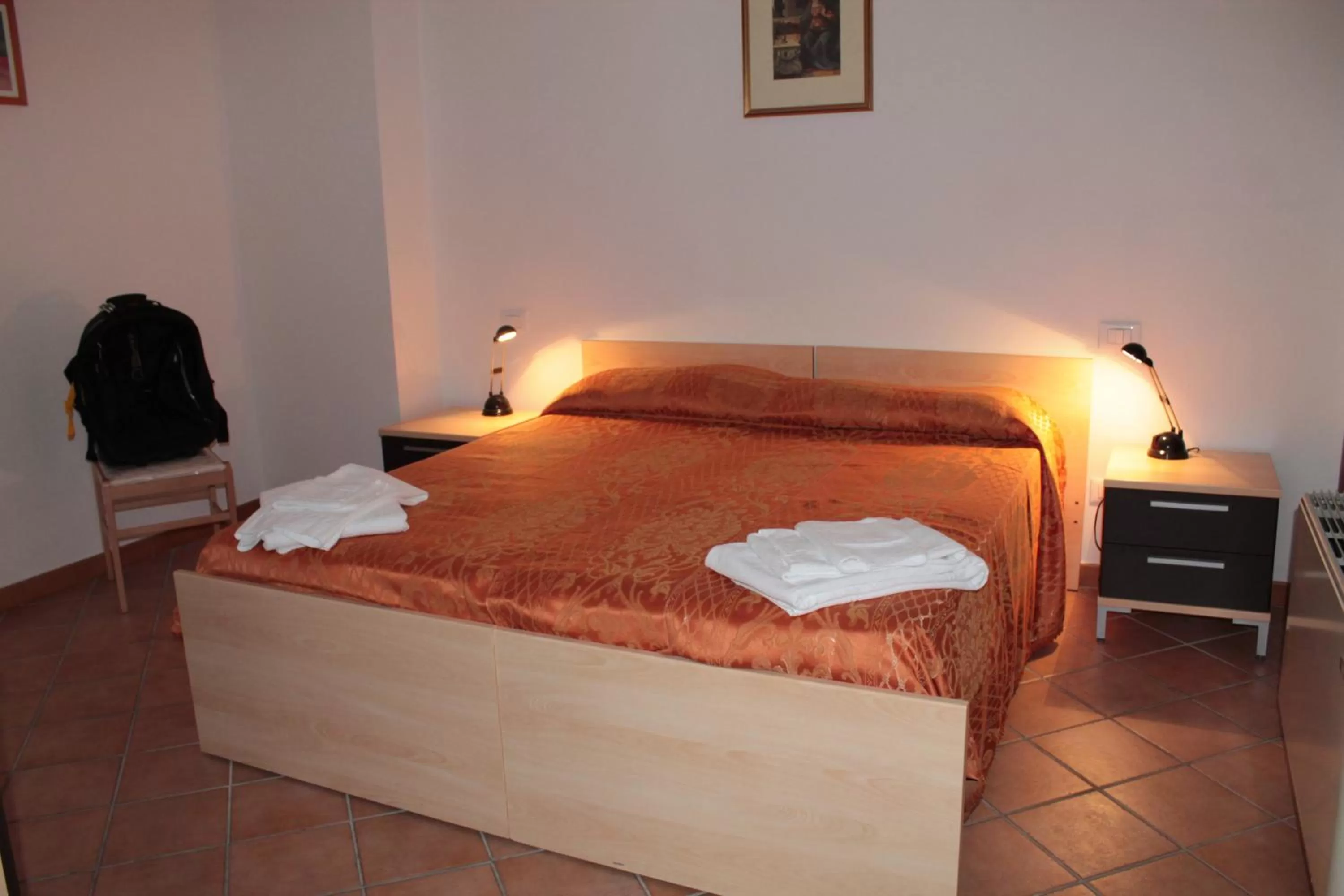 Photo of the whole room, Bed in Residence Sol Levante