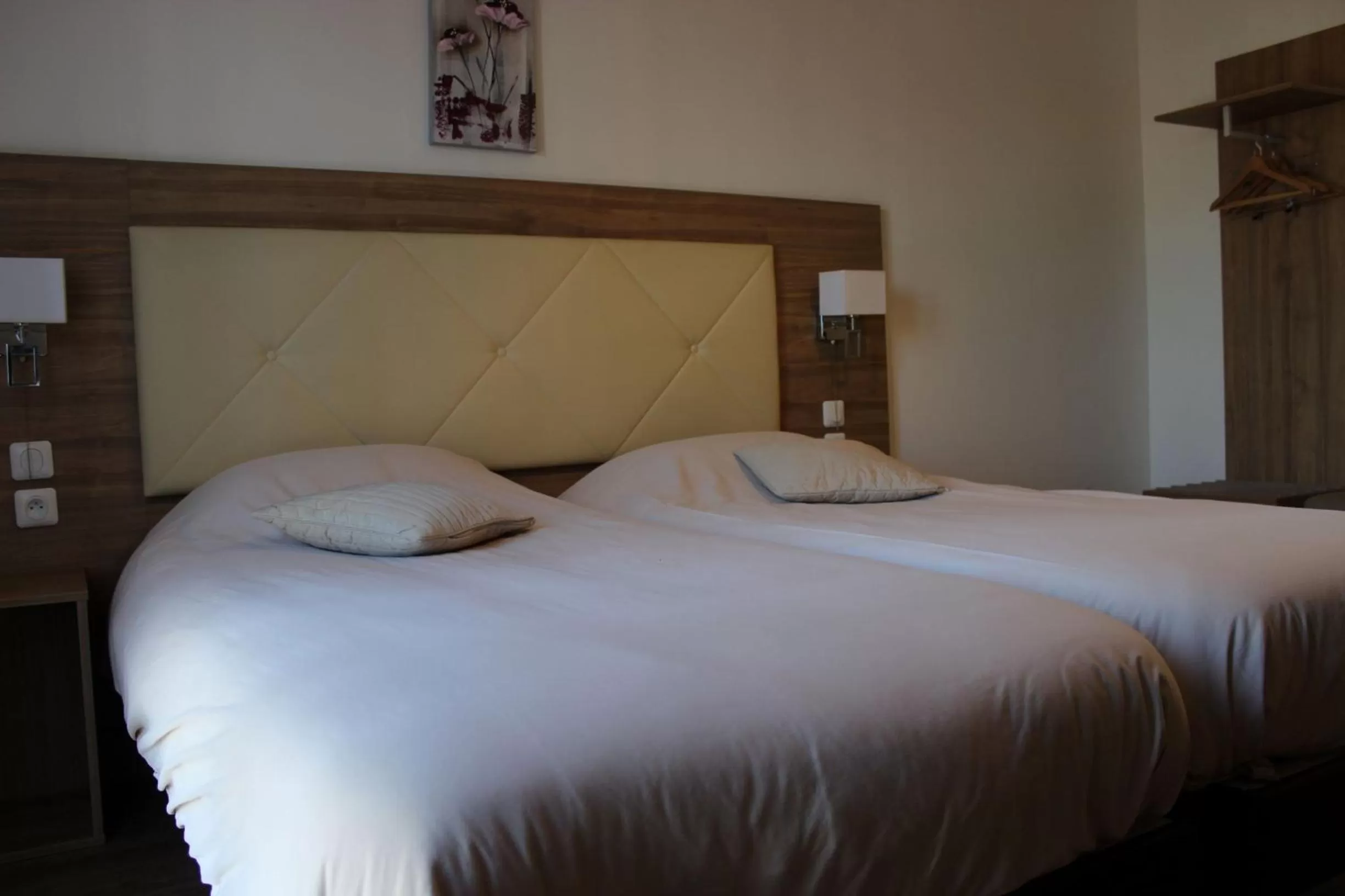 Bed in Le Grand Hôtel Molière