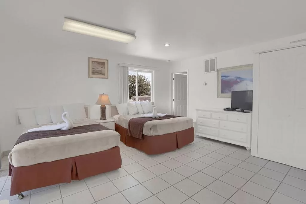 Bed in Heart of Wildwood Boardwalk Motel