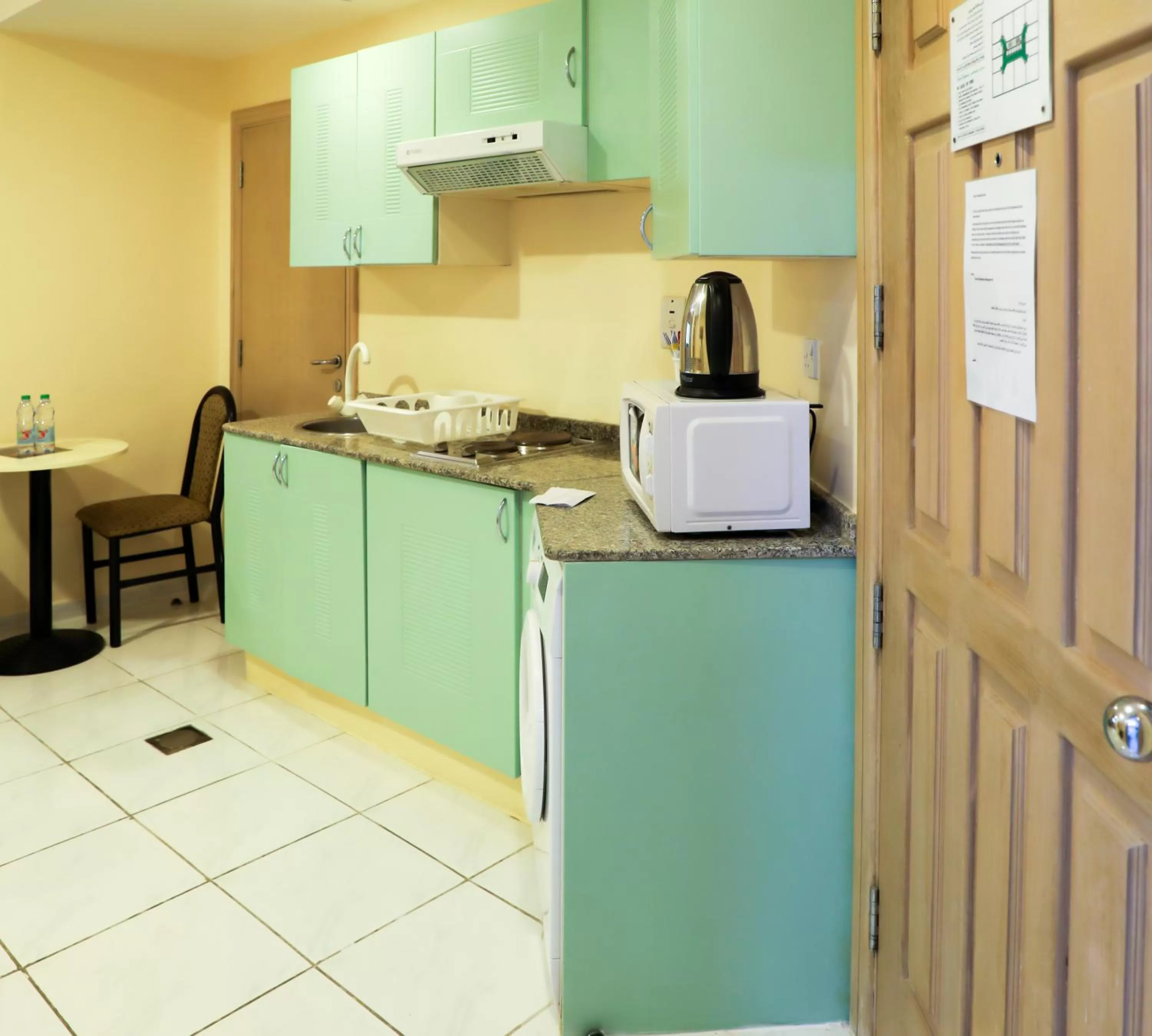 kitchen in West Zone Pearl Hotel Apartment