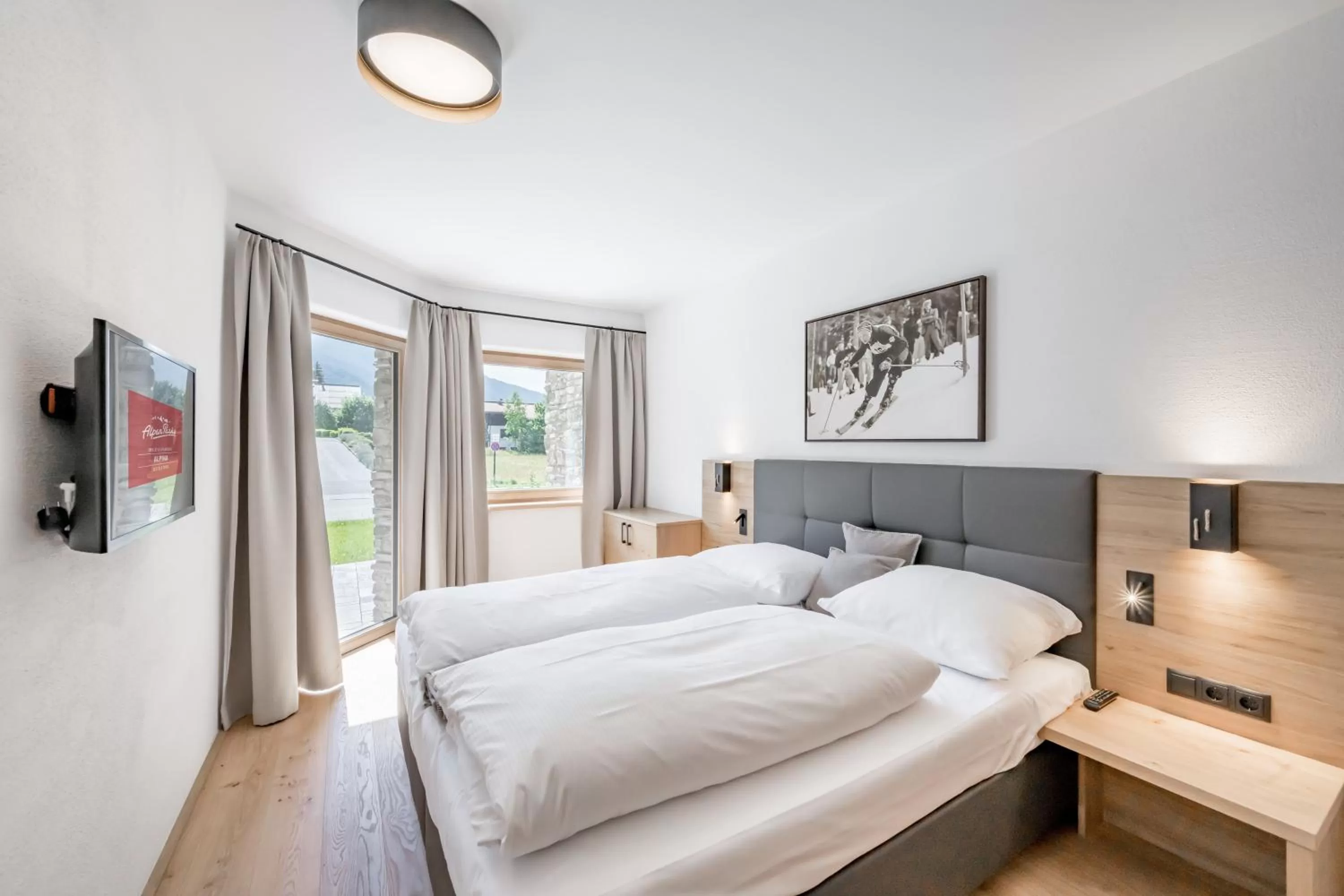 TV and multimedia, Bed in AlpenParks Chalet & Apartment Alpina Seefeld