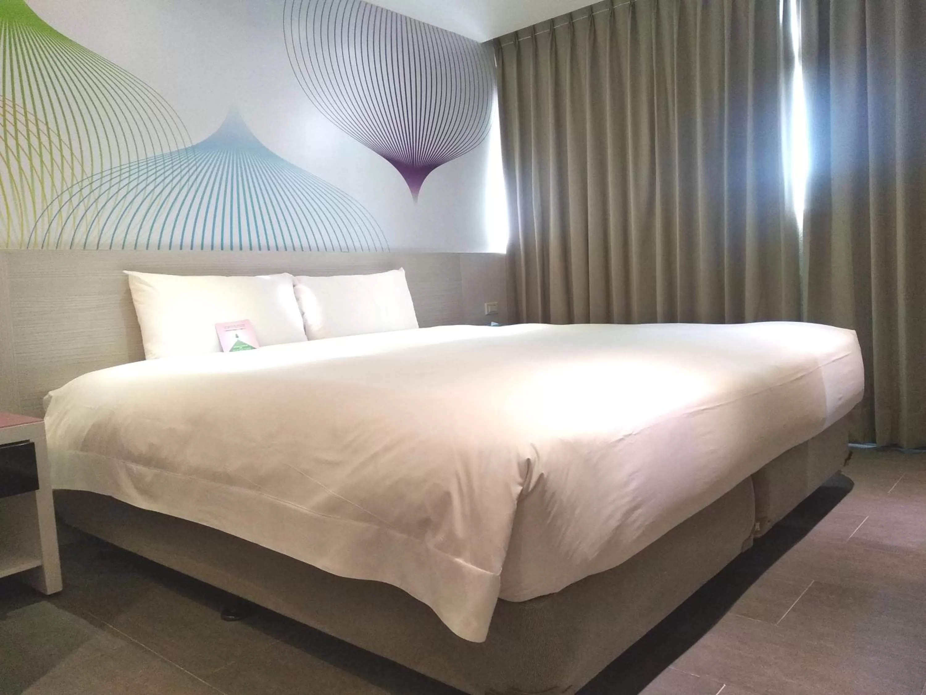 Bed in Wholesome Hotel