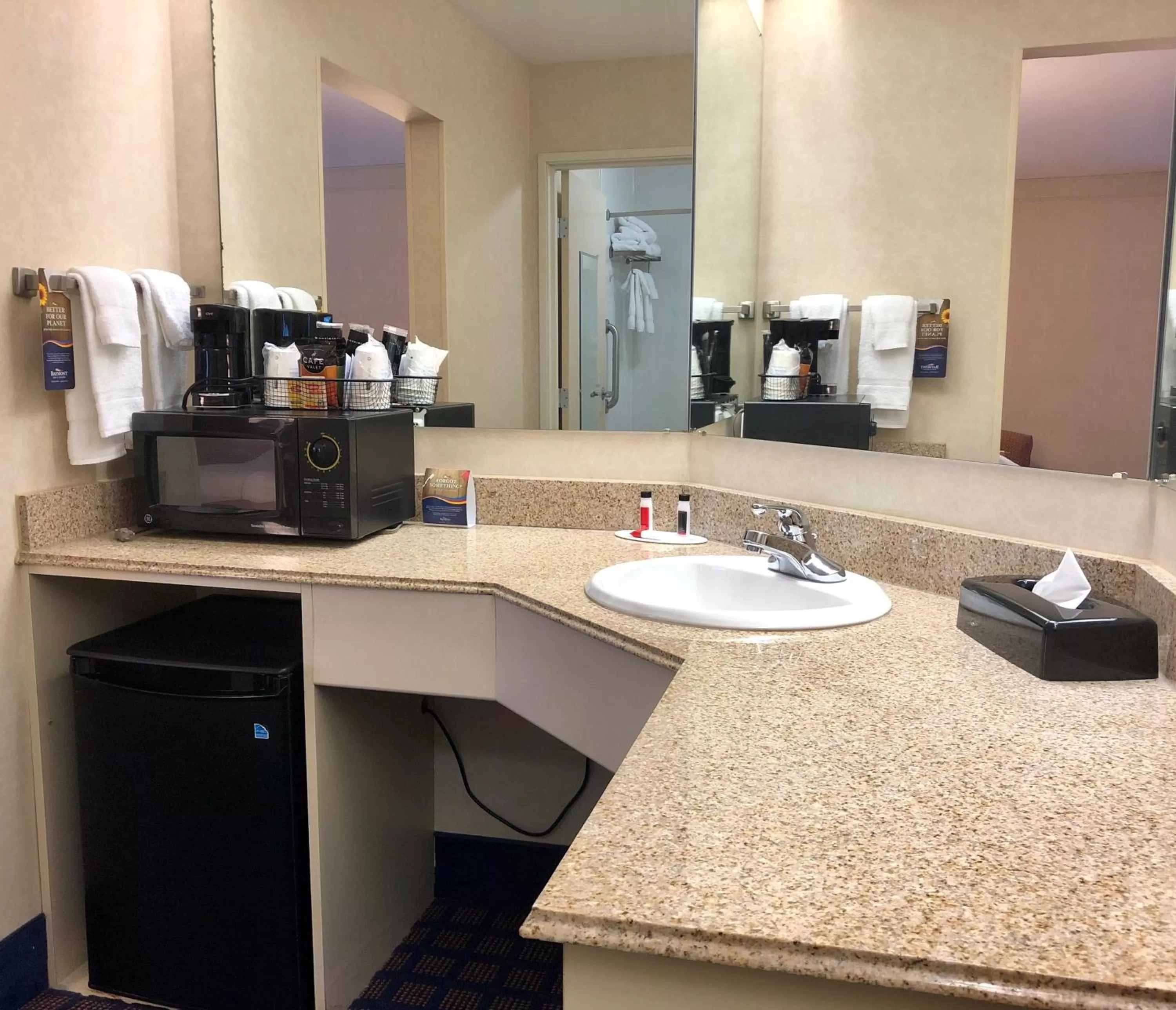 Bathroom in Baymont by Wyndham Grand Rapids SW/Byron Center