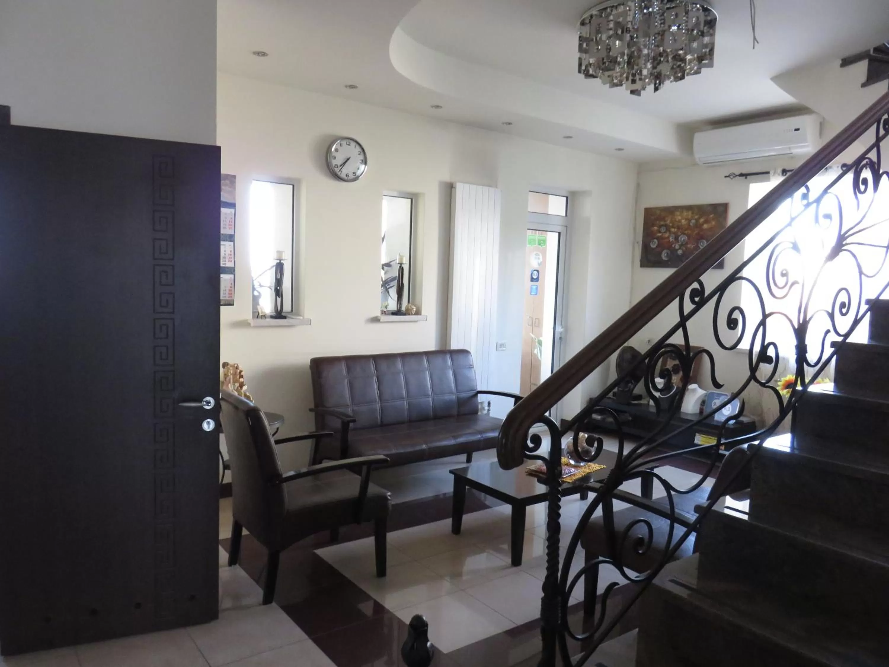 Communal lounge/ TV room in Hotel Grig