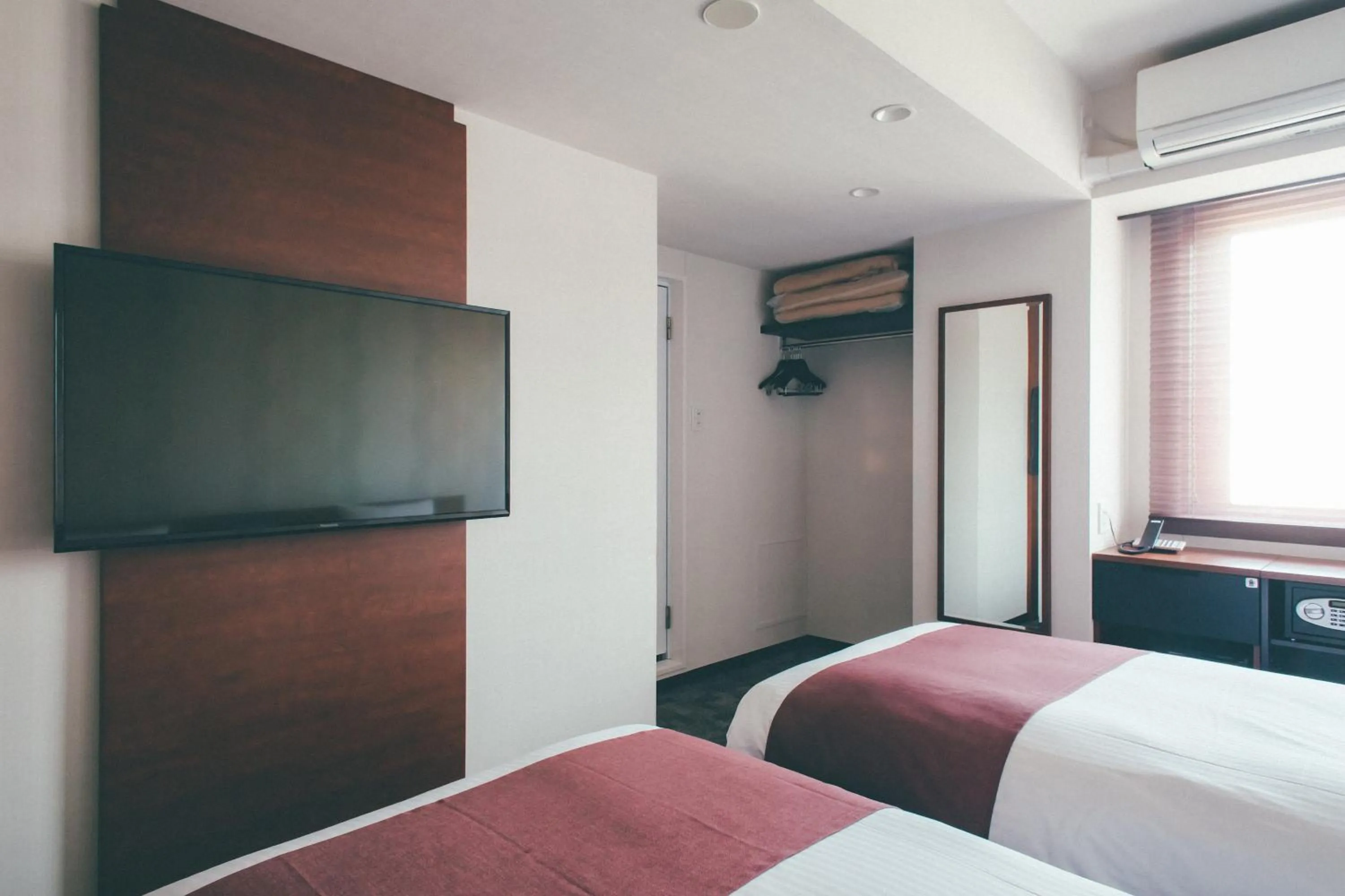 Bed in Hotel Kuretakeso Takayama Ekimae