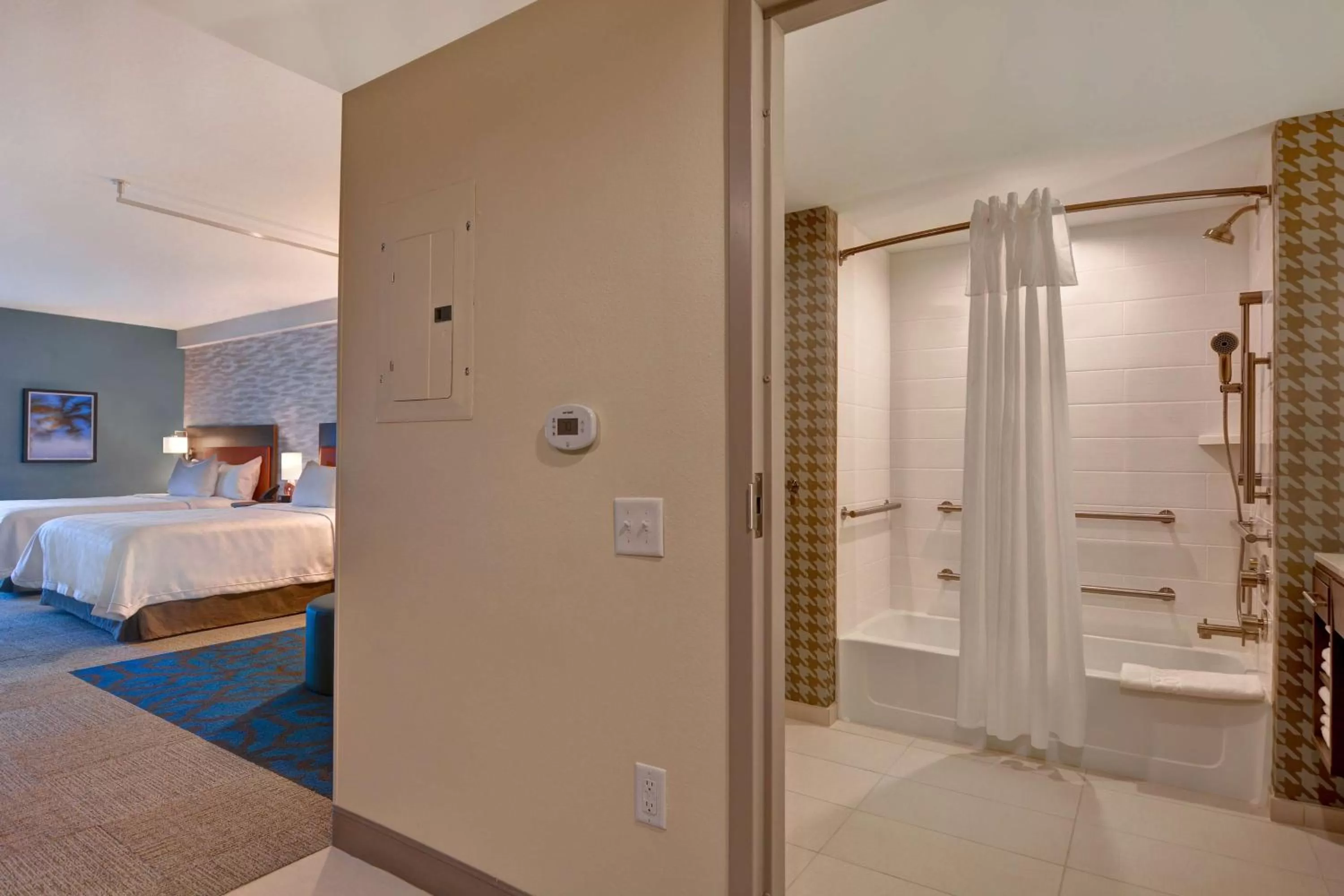 Bathroom, Bed in Home2 Suites By Hilton Orlando Flamingo Crossings, FL