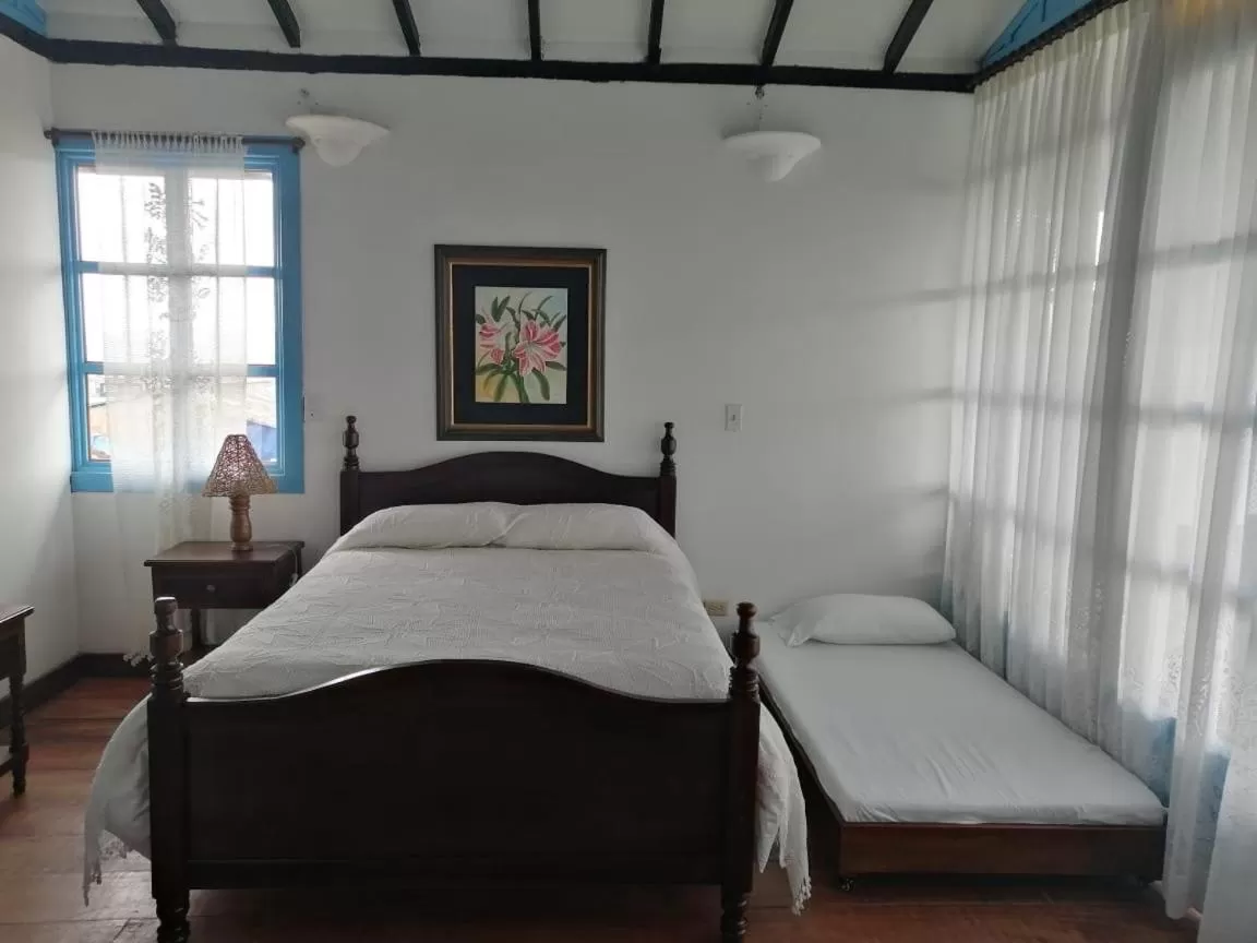 Bed in Casa Hotel El Compadre