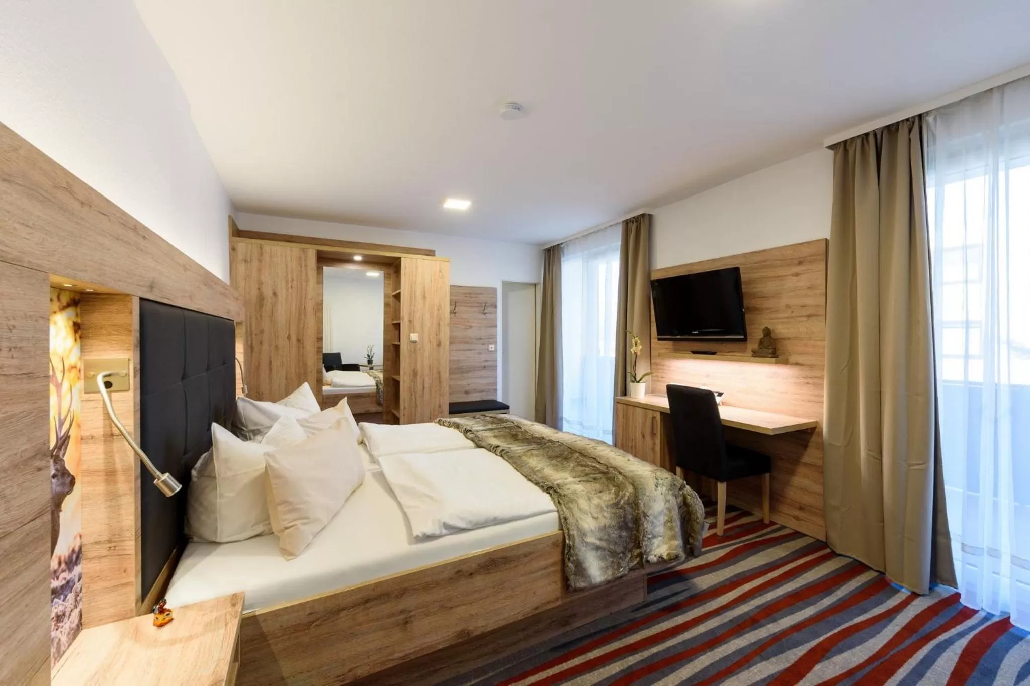 Photo of the whole room, Bed in Wellness & Ayurveda Hotel Am Eichenberg