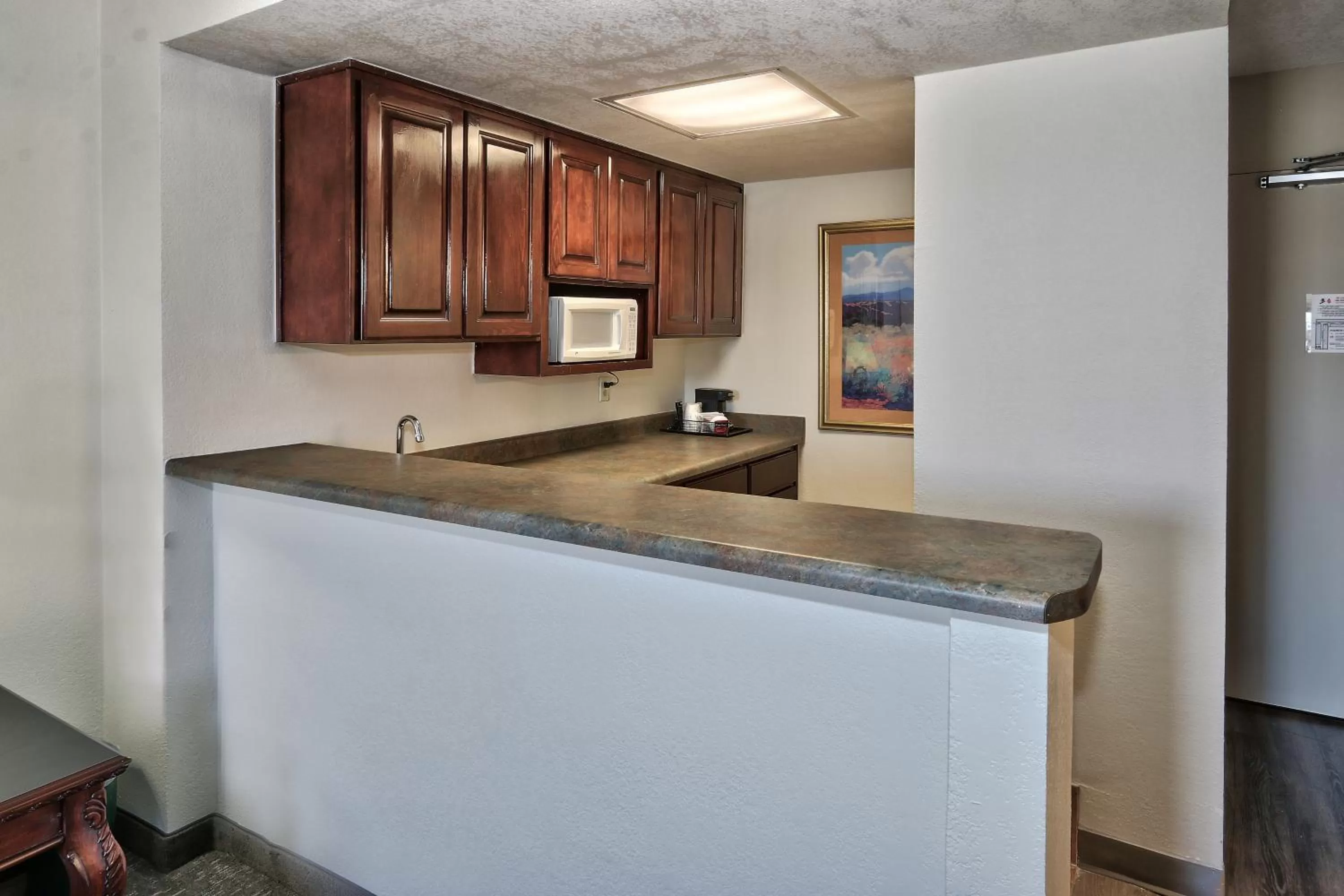 Kitchen or kitchenette in Ramada by Wyndham Albuquerque Midtown