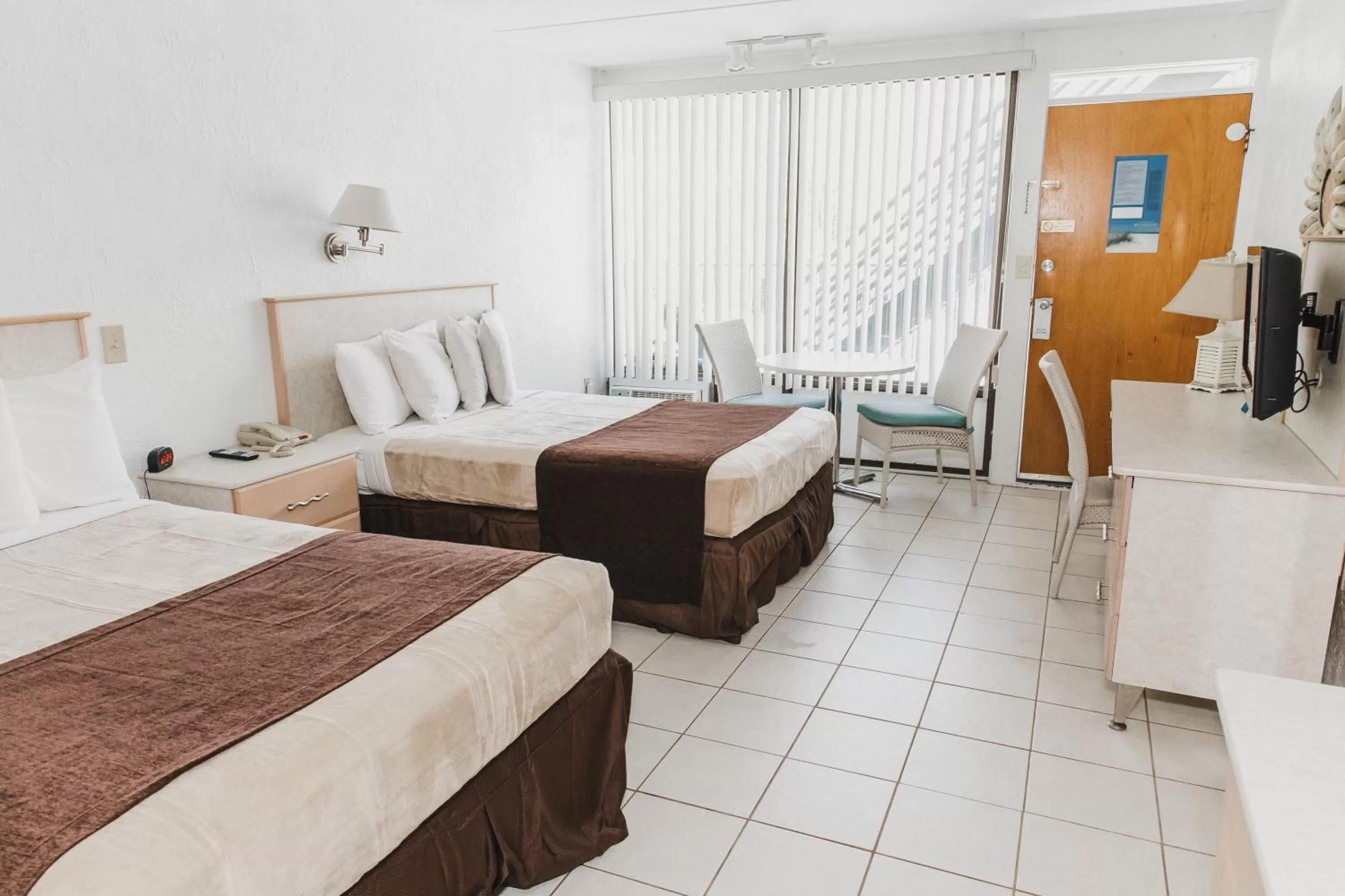 Bed in Heart of Wildwood Boardwalk Motel